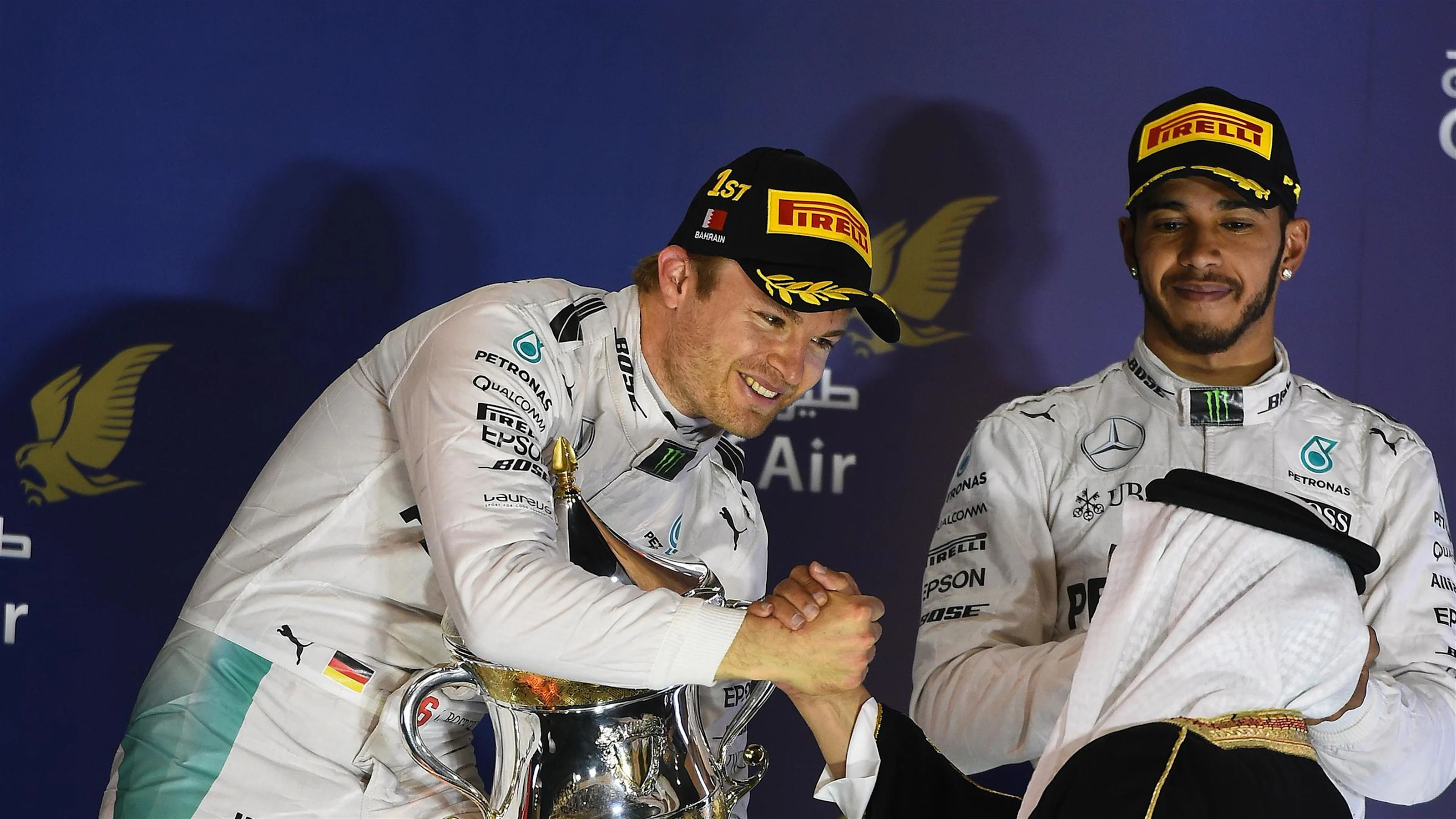 Race winner Nico Rosberg (GER) Mercedes AMG F1 celebrates on the podium with the trophy at Formula