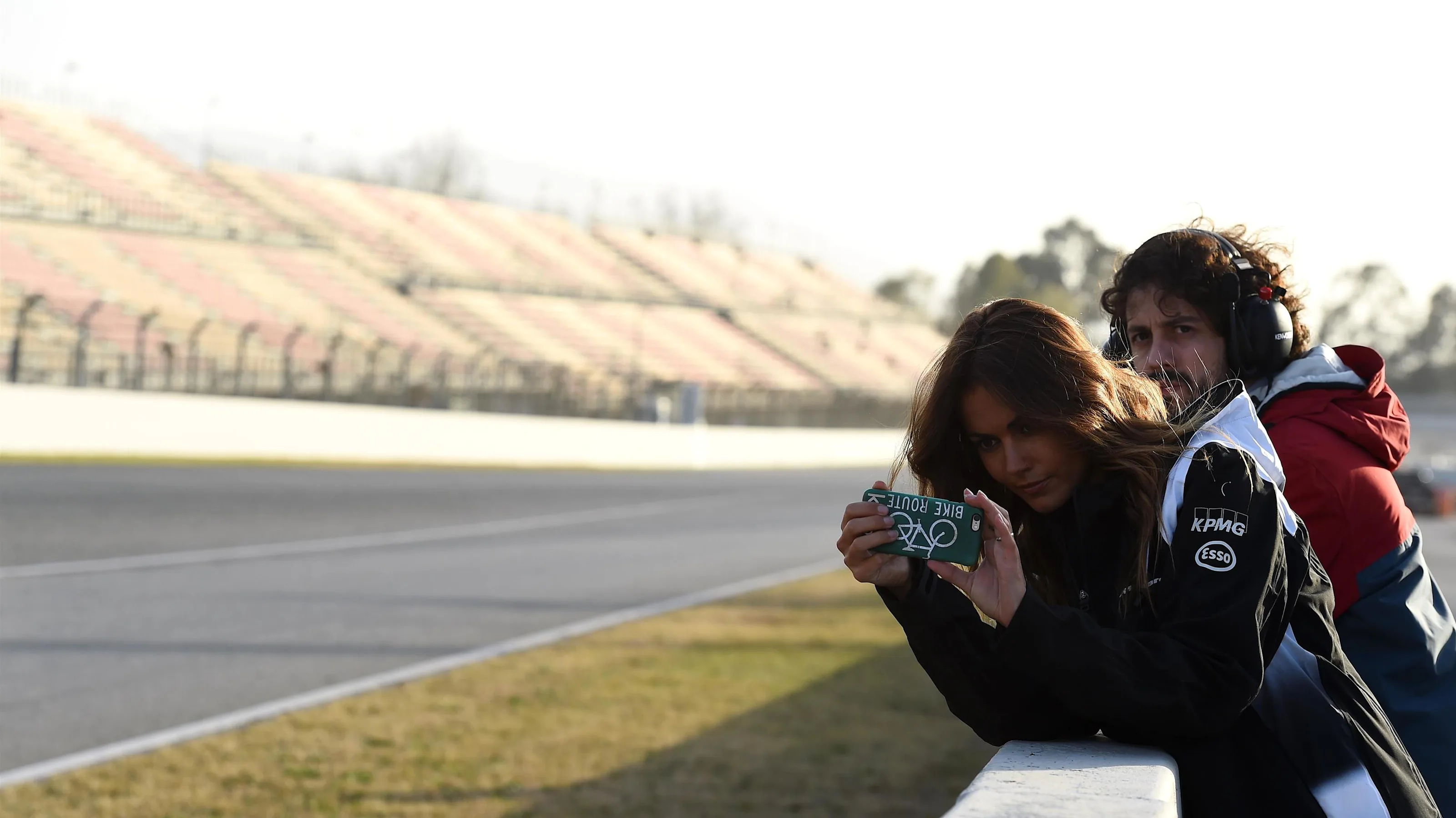 Lara Alvarez (ESP) girlfriend of Fernando Alonso (ESP) McLaren takes a photograph at Formula One