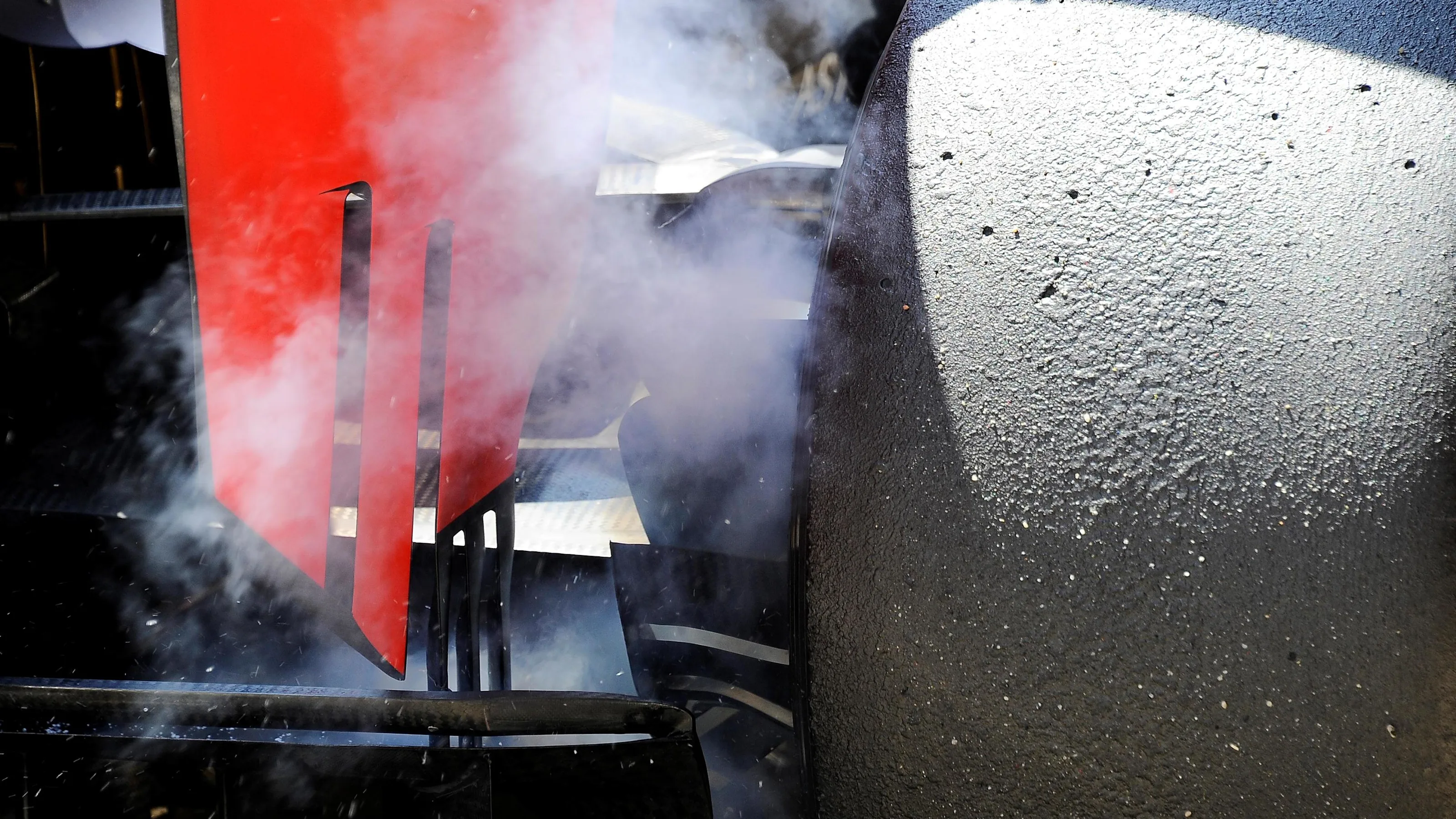 Scuderia Toro Rosso STR11 brake smoke at Formula One Testing, Day One, Barcelona, Spain, 17 May