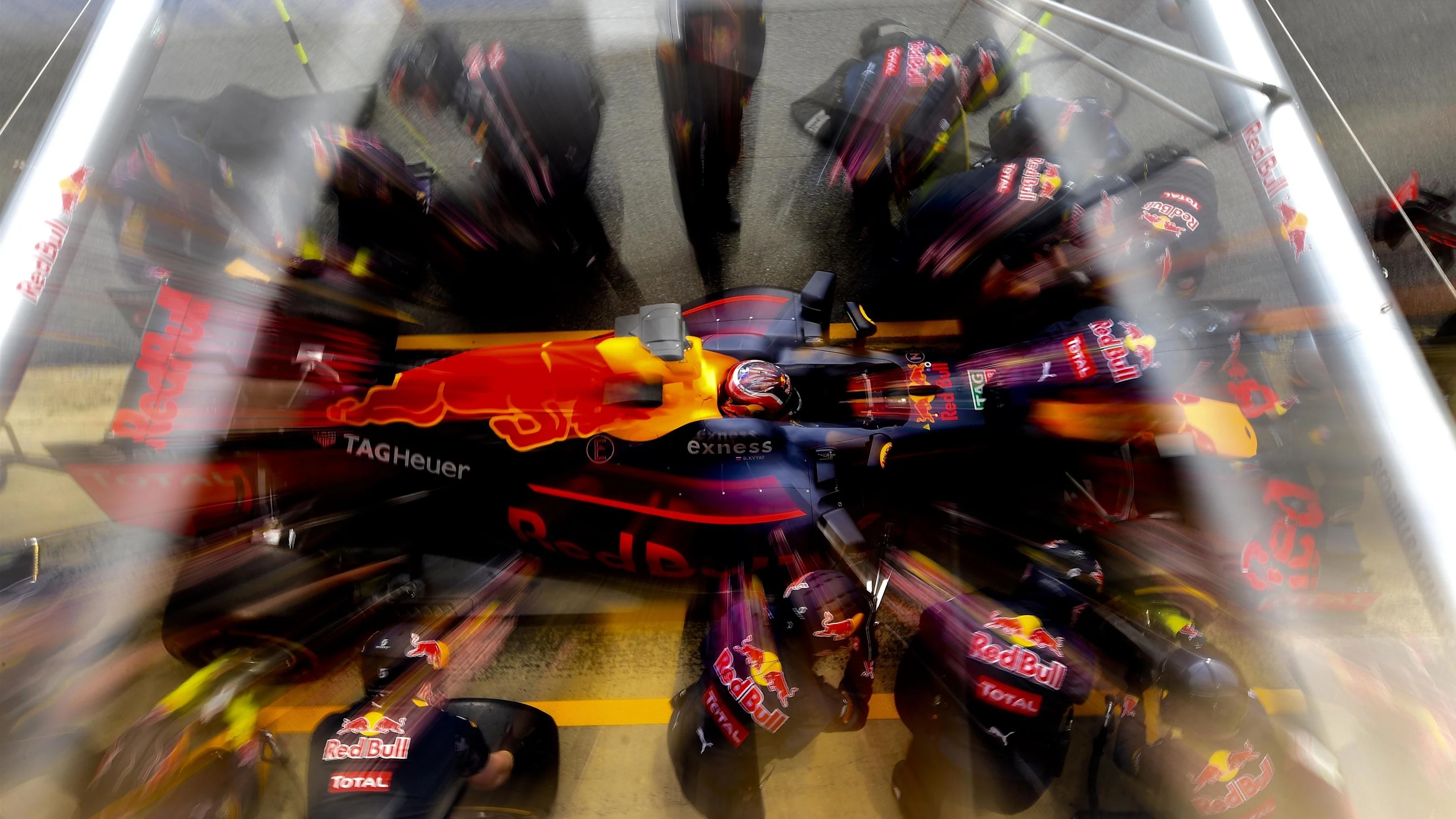 Daniil Kvyat (RUS) Red Bull Racing RB12 makes a pit stop at Formula One Testing, Day Three,