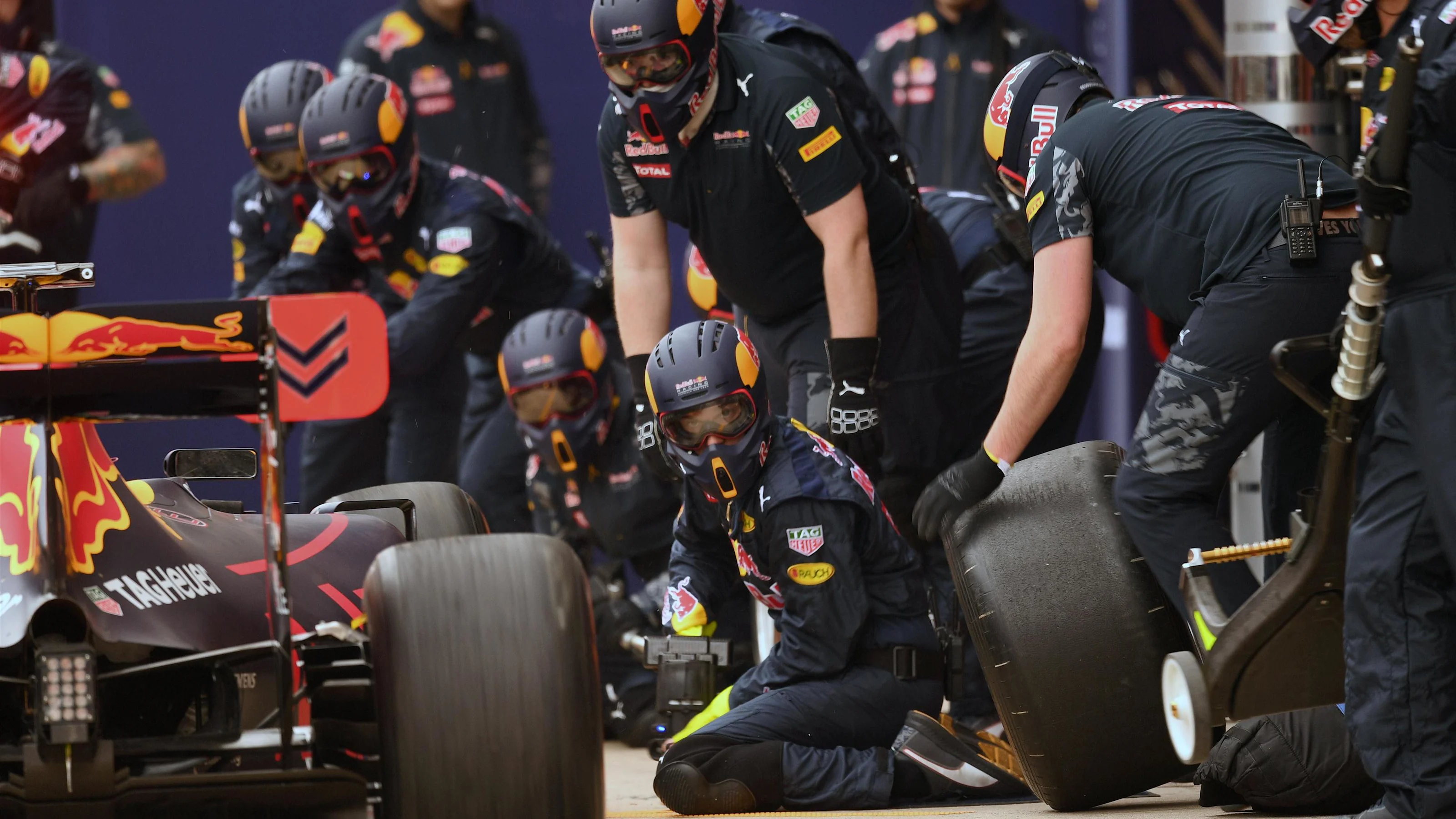 Red Bull Racing mechanics during a pit stop at Formula One Testing, Day Two, Barcelona, Spain,