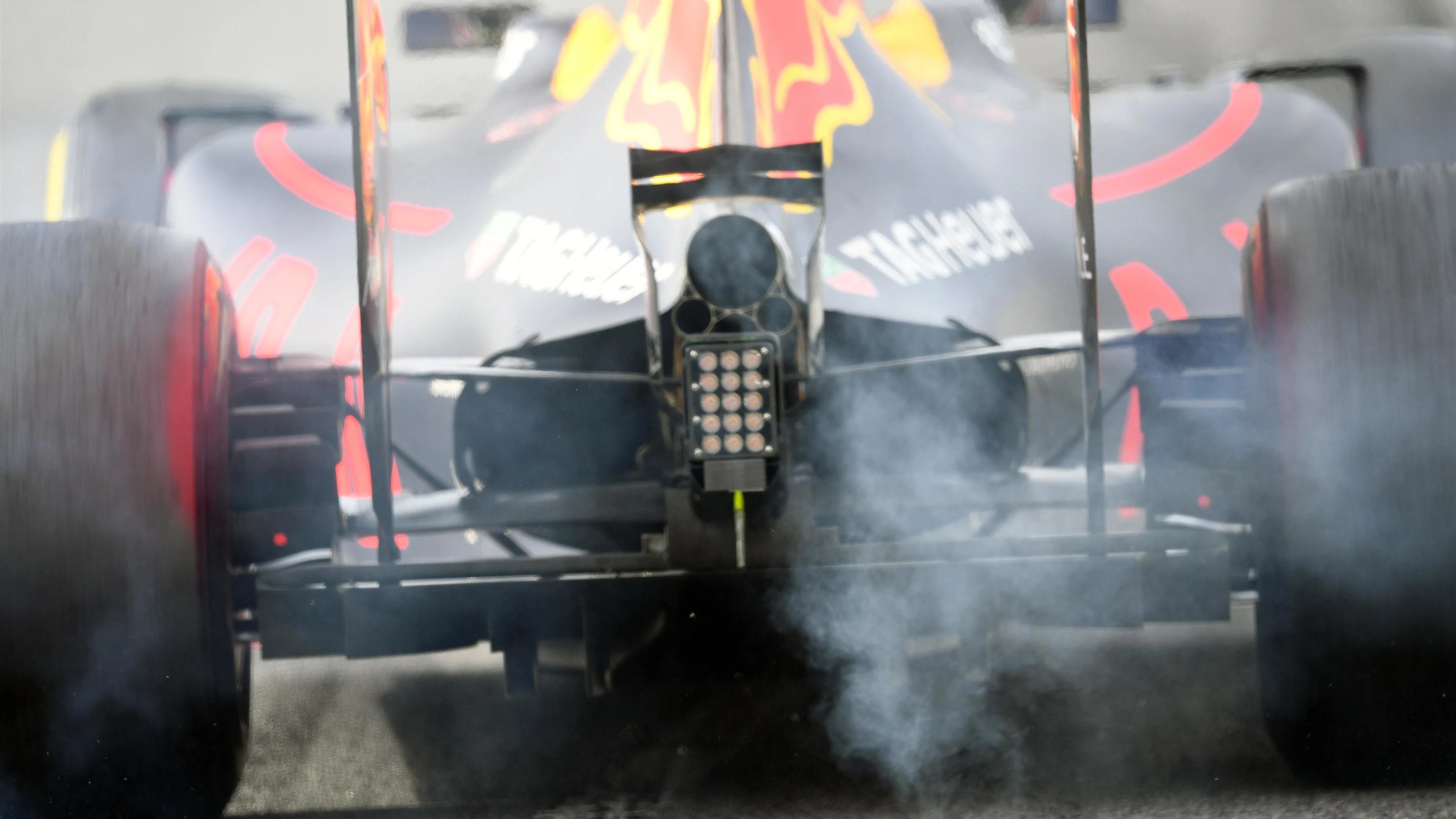 Daniel Ricciardo (AUS) Red Bull Racing RB12 and tyre smoke at Formula One Testing, Day Two,