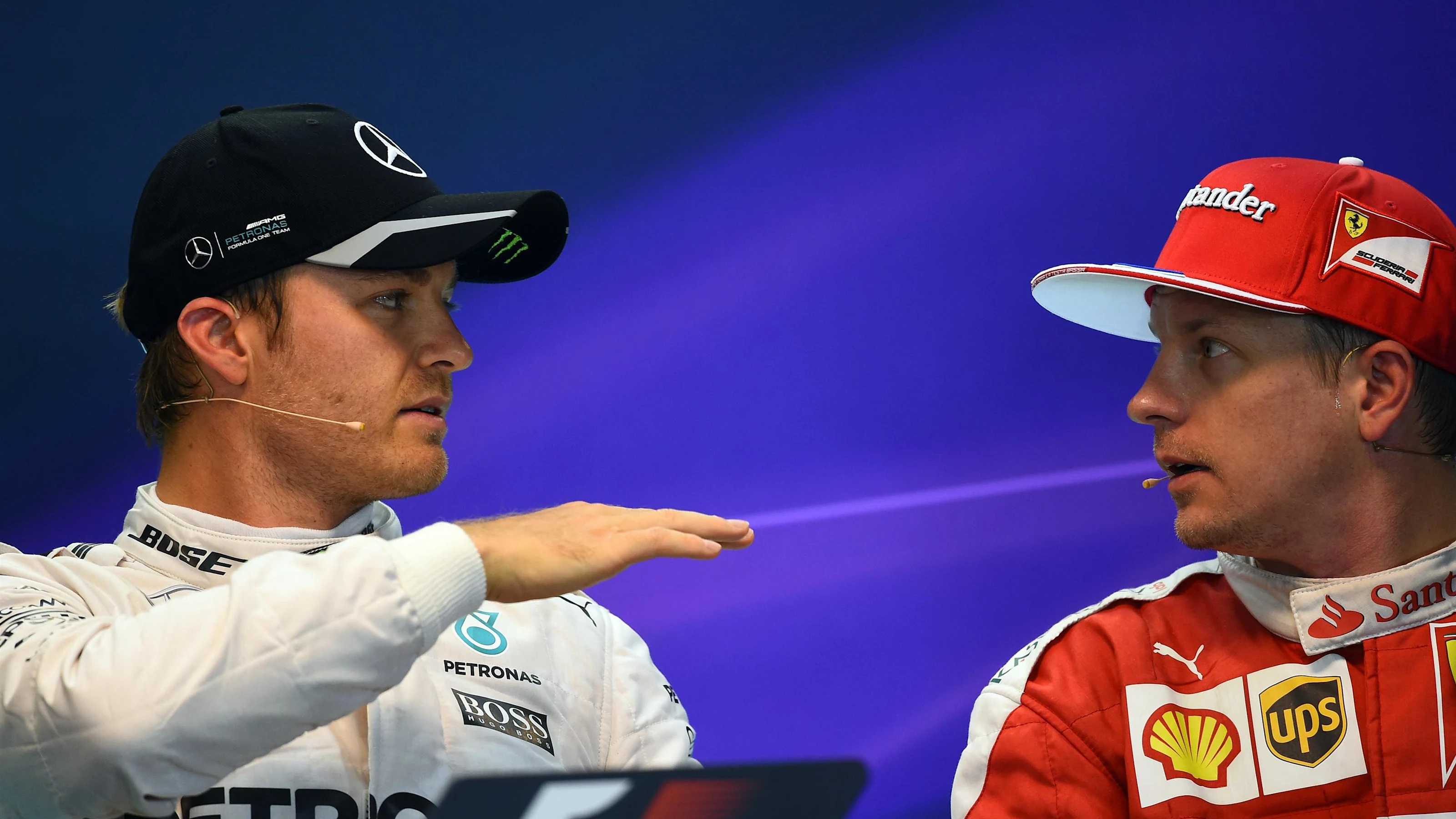 Nico Rosberg (GER) Mercedes AMG F1 and Kimi Raikkonen (FIN) Ferrari in the Press Conference at