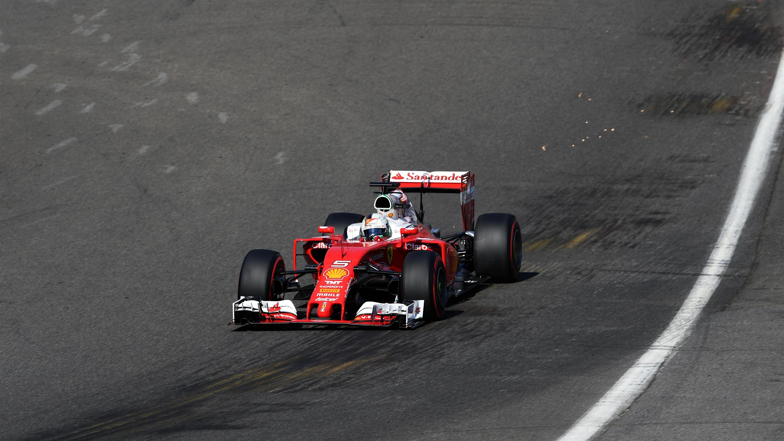 Sebastian Vettel (GER) Ferrari SF16-H sparks at Formula One World Championship, Rd13, Belgian Grand