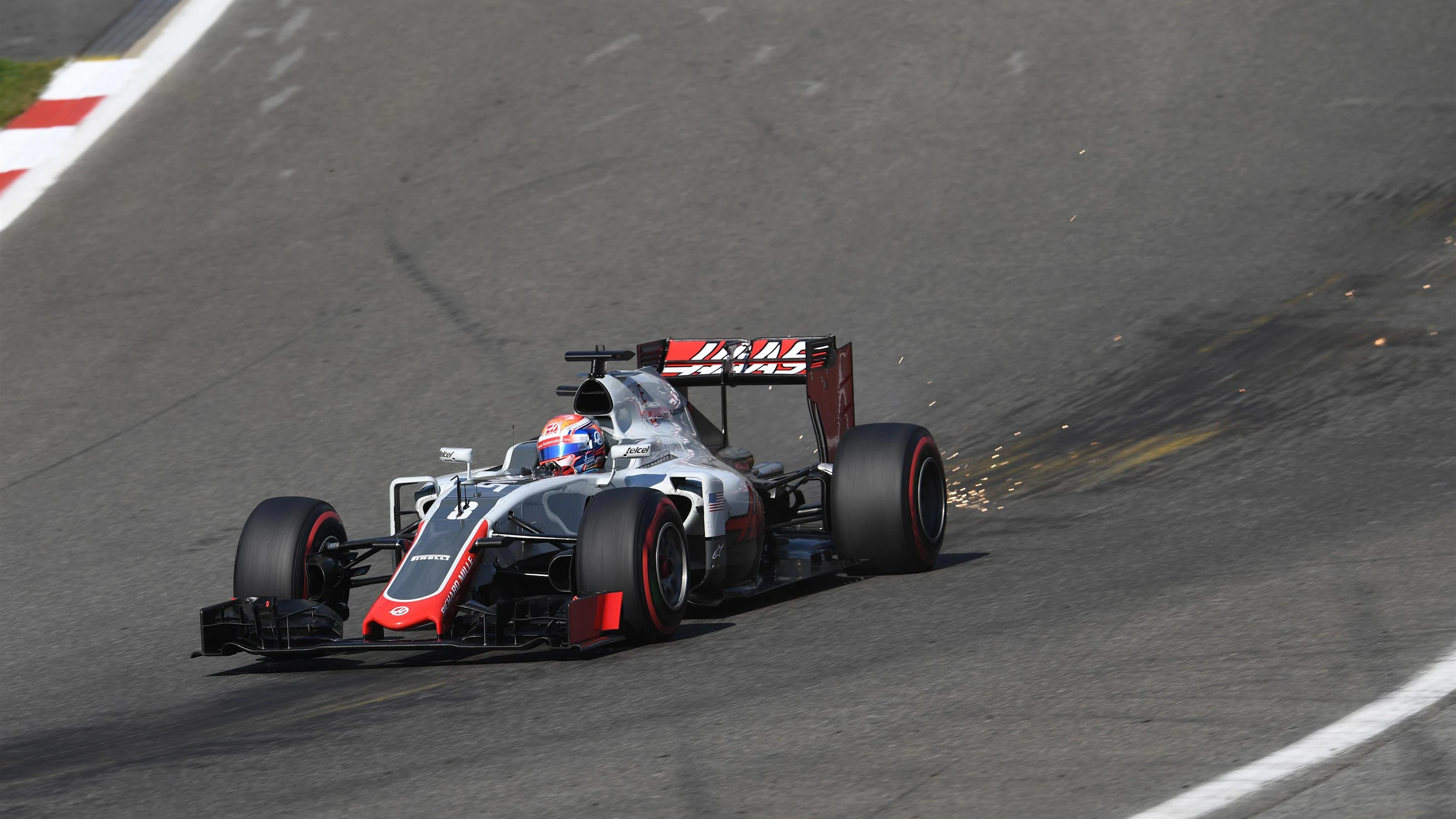 Romain Grosjean (FRA) Haas VF-16 sparks at Formula One World Championship, Rd13, Belgian Grand