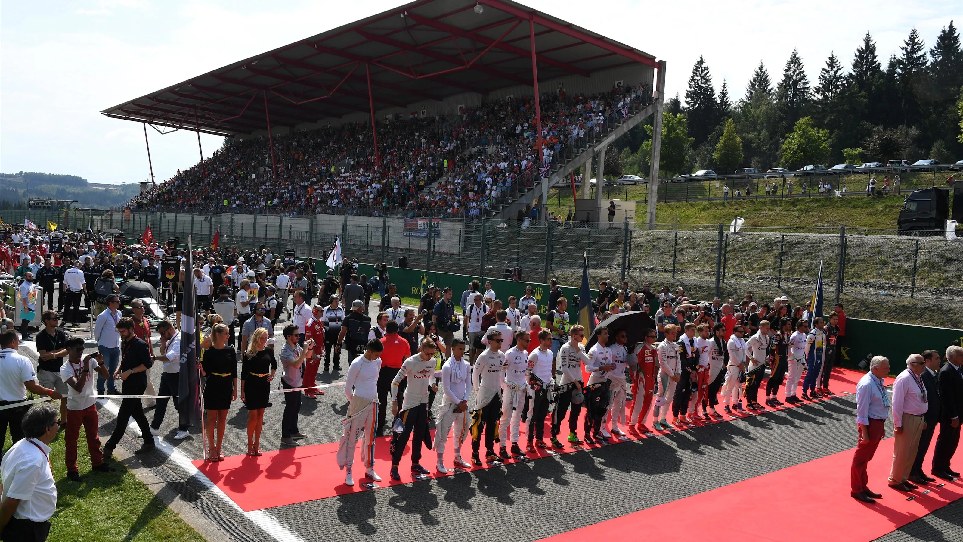 Driver observe the National Anthem on the grid at Formula One World Championship, Rd13, Belgian