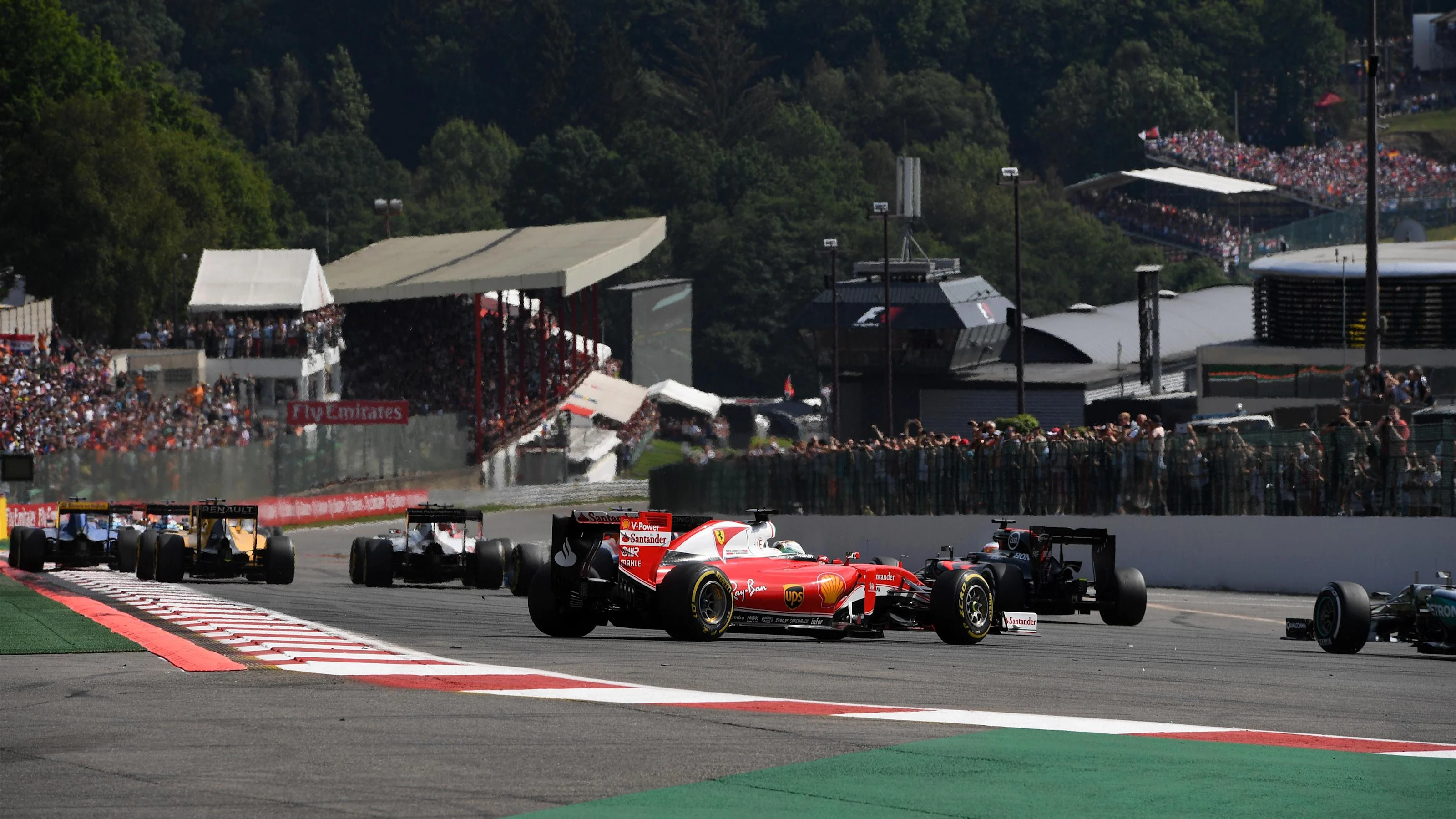 Sebastian Vettel (GER) Ferrari SF16-H and Kimi Raikkonen (FIN) Ferrari SF16-H collide at the start