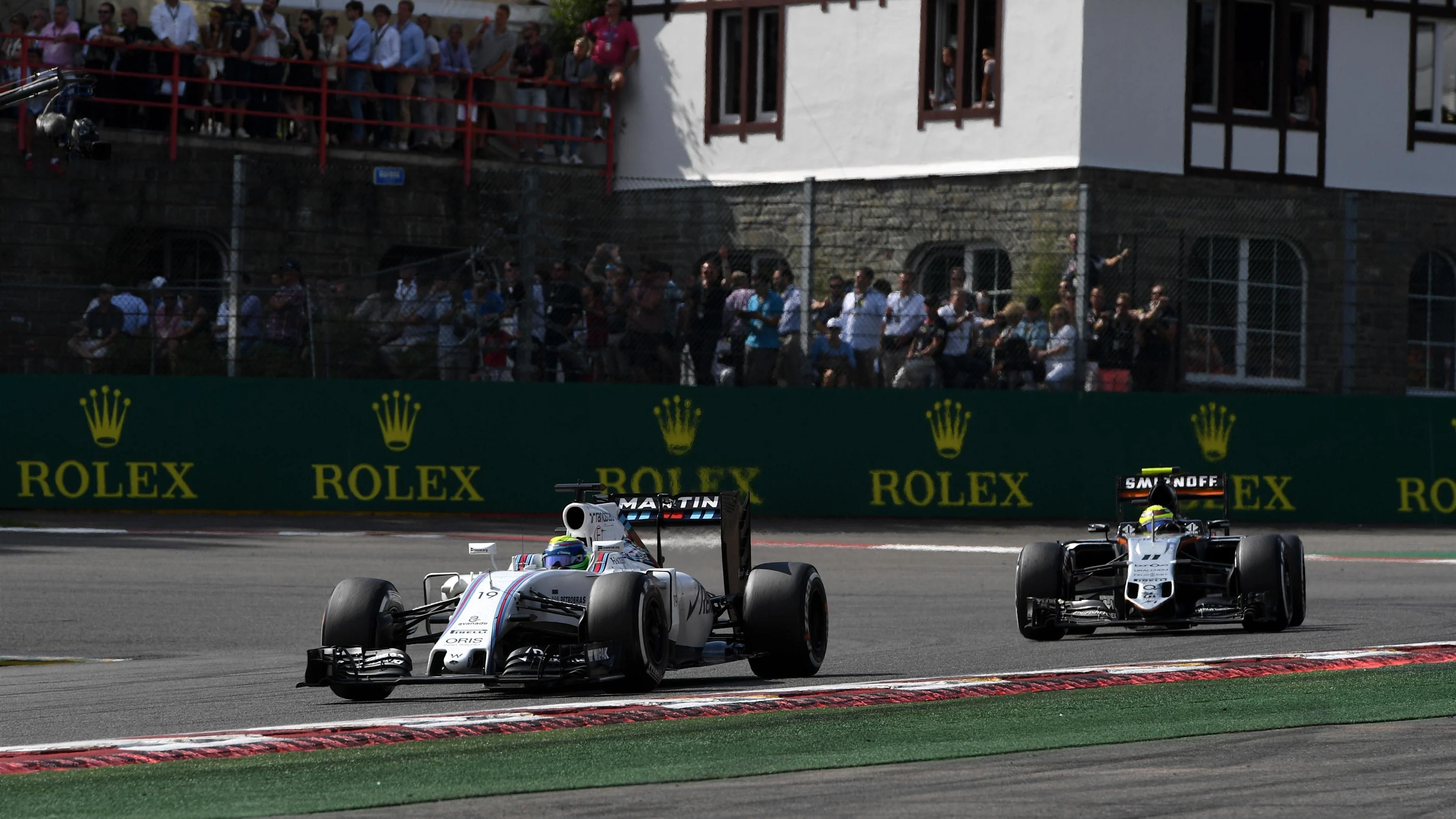 Felipe Massa (BRA) Williams FW38 and Sergio Perez (MEX) Force India VJM09 at Formula One World
