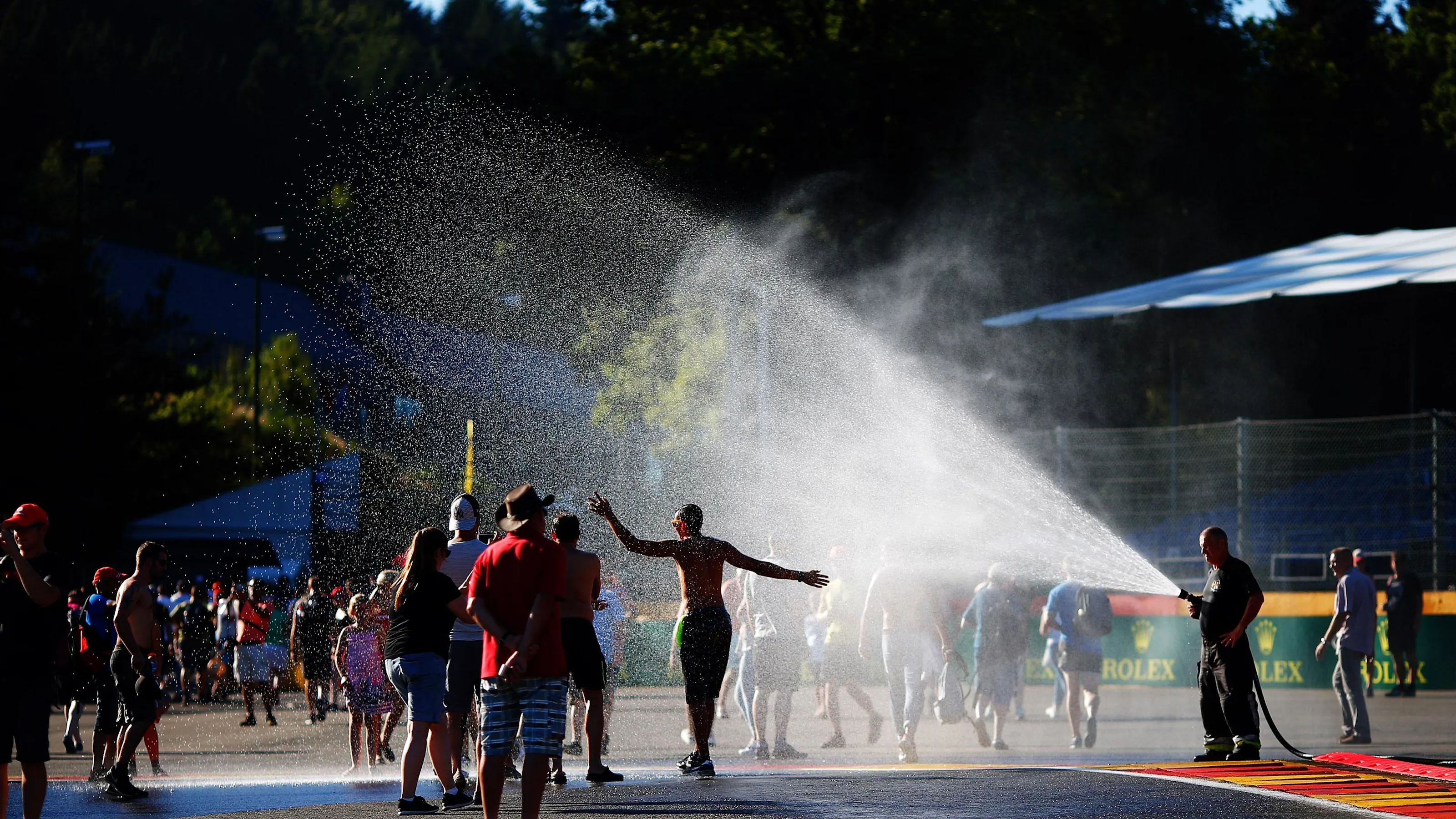 Fans and water hose at Formula One World Championship, Rd13, Belgian Grand Prix, Preparations, Spa