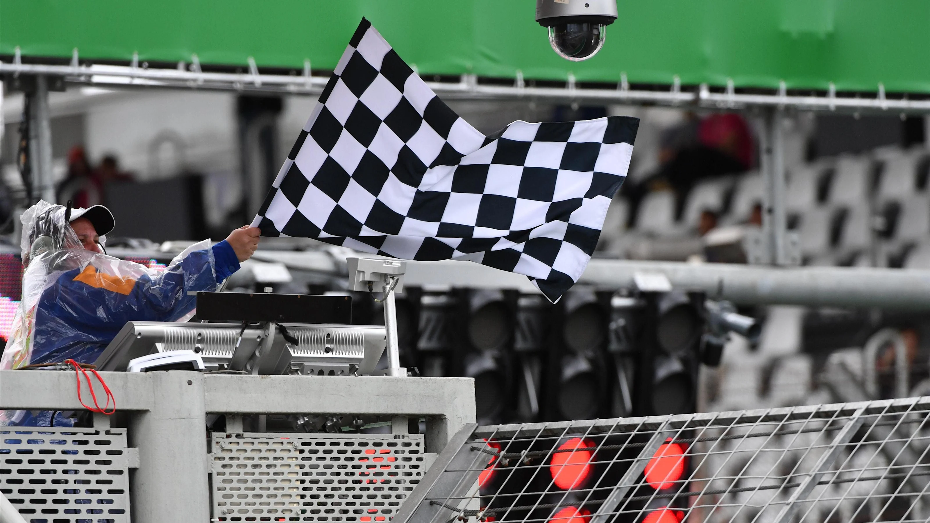 Marshals wave the chequered flag at Formula One World Championship, Rd20, Brazilian Grand Prix,
