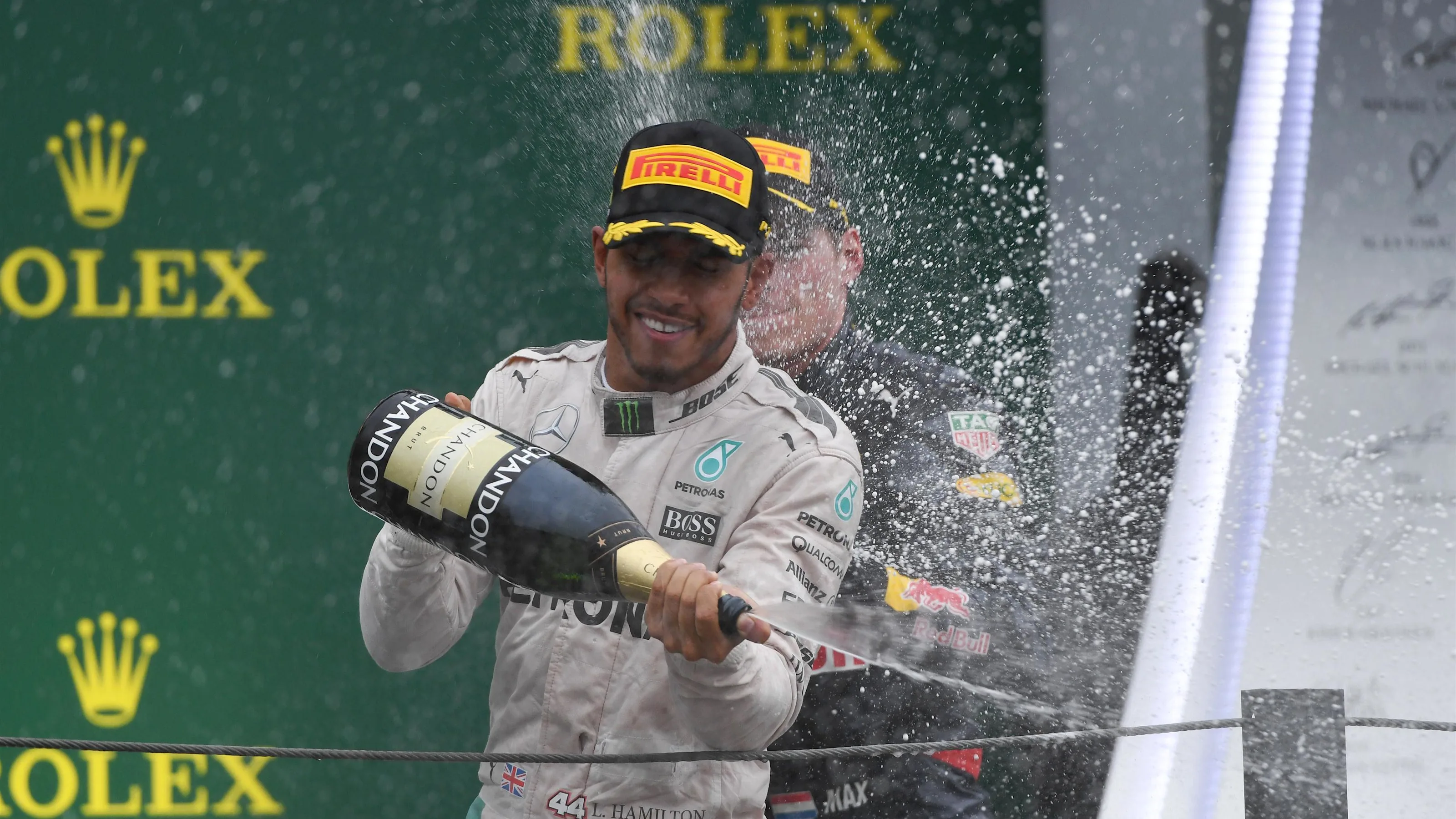 Lewis Hamilton (GBR) Mercedes AMG F1 and Max Verstappen (NED) Red Bull Racing celebrate on the