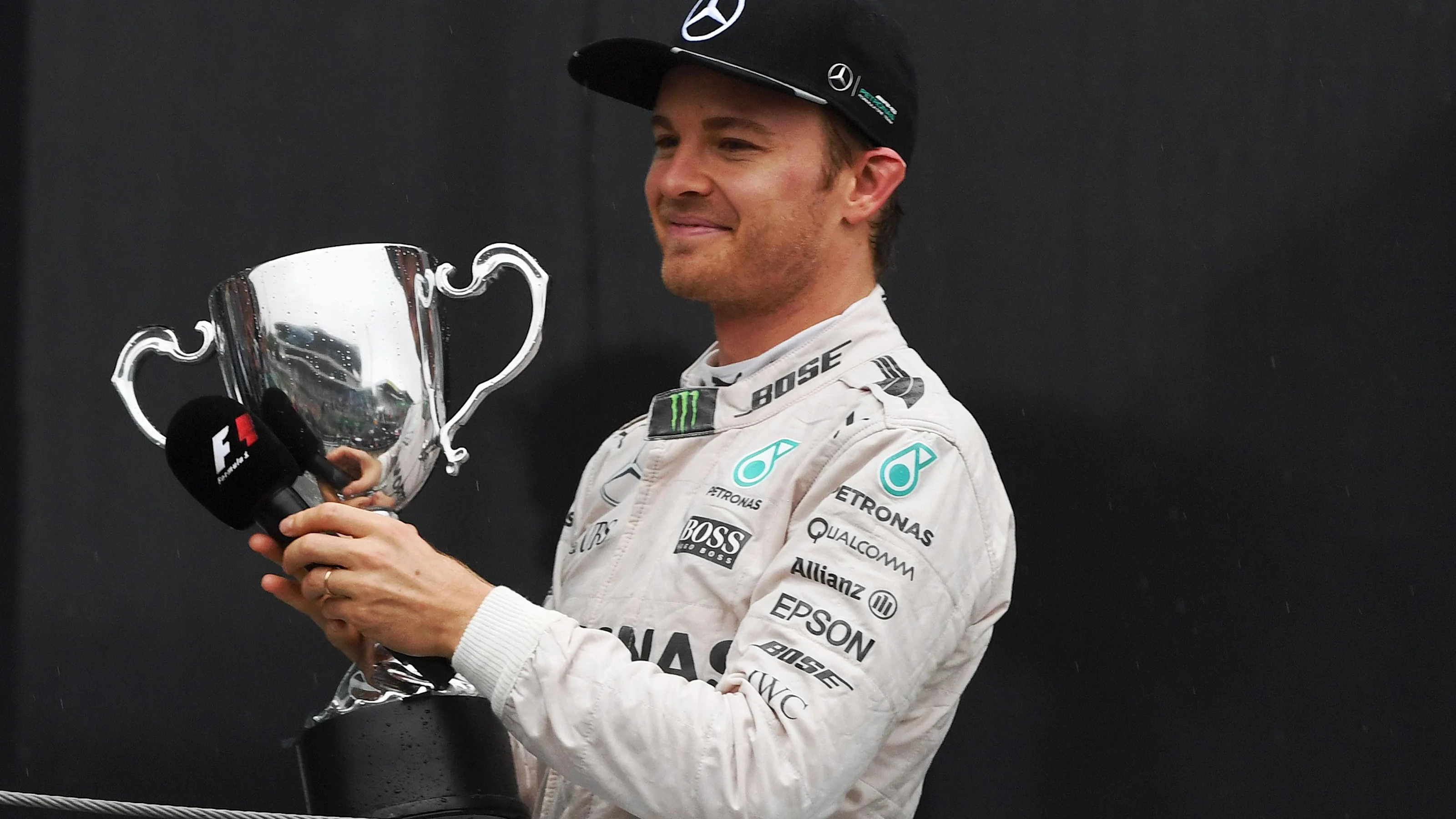 Nico Rosberg (GER) Mercedes AMG F1 celebrates on the podium with the trophy at Formula One World