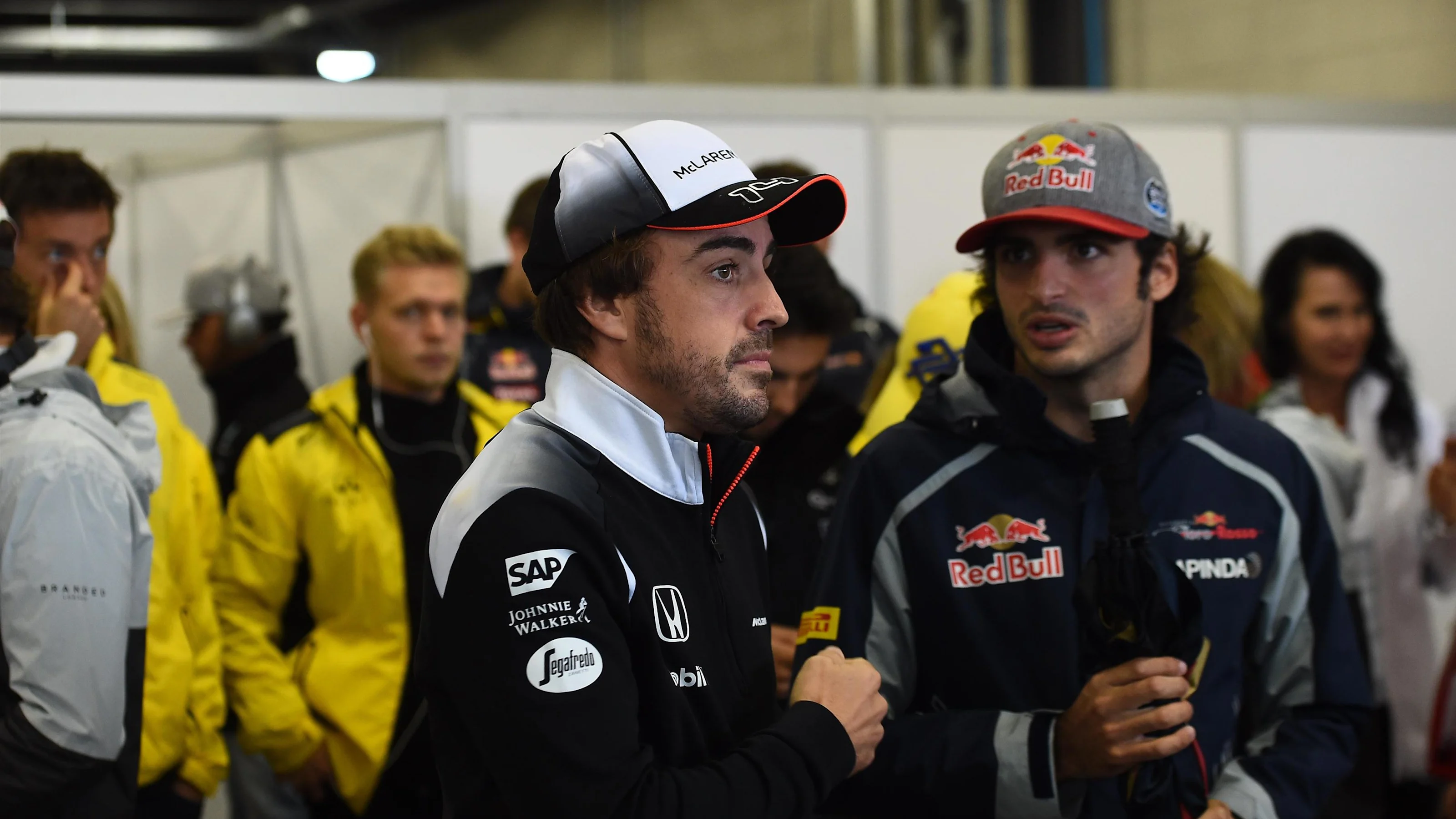 Fernando Alonso (ESP) McLaren and Carlos Sainz jr (ESP) Scuderia Toro Rosso on the drivers parade