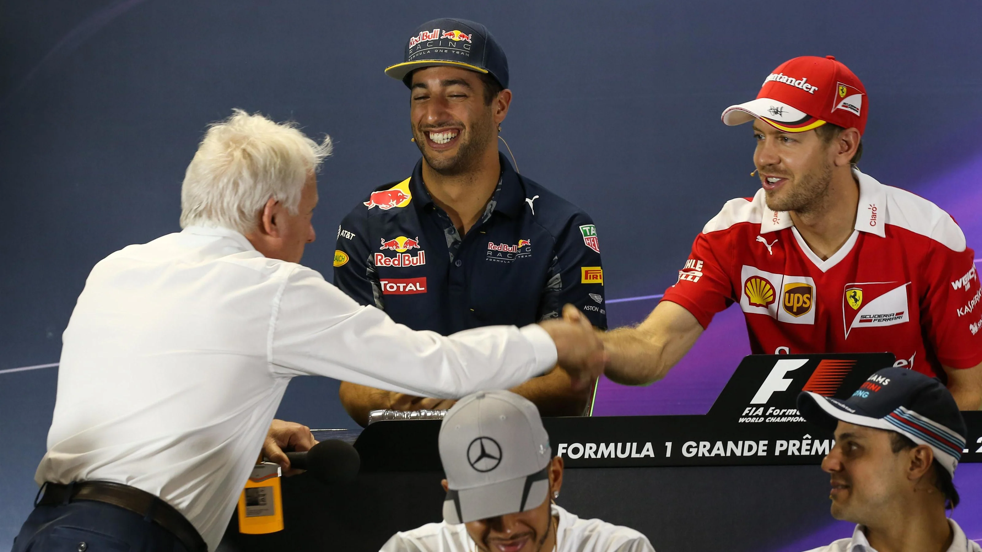 Charlie Whiting (GBR) FIA Delegate shakes hands with Sebastian Vettel (GER) Ferrari in the Press