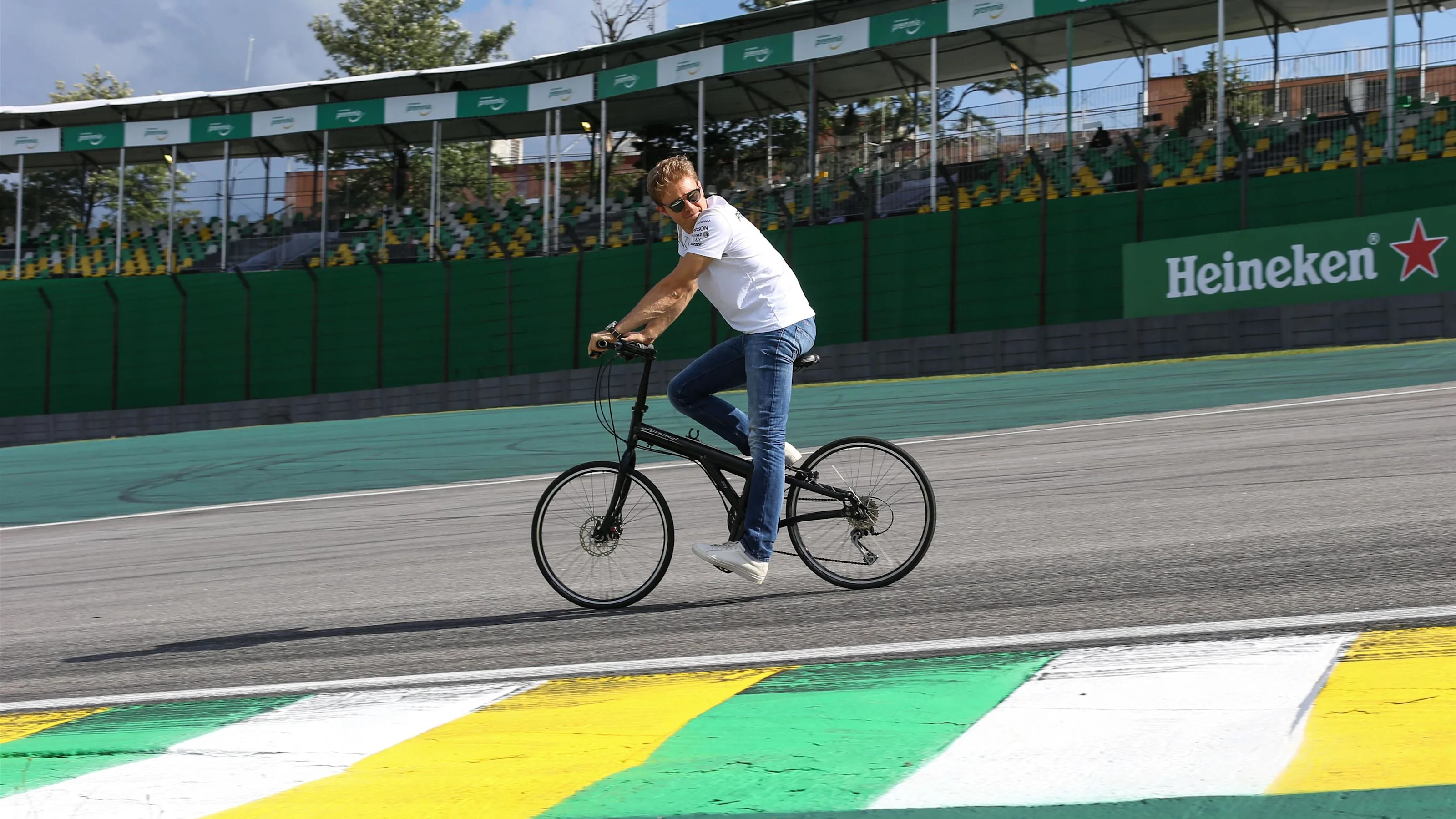 Nico Rosberg (GER) Mercedes AMG F1 rides the track on a bike at Formula One World Championship,