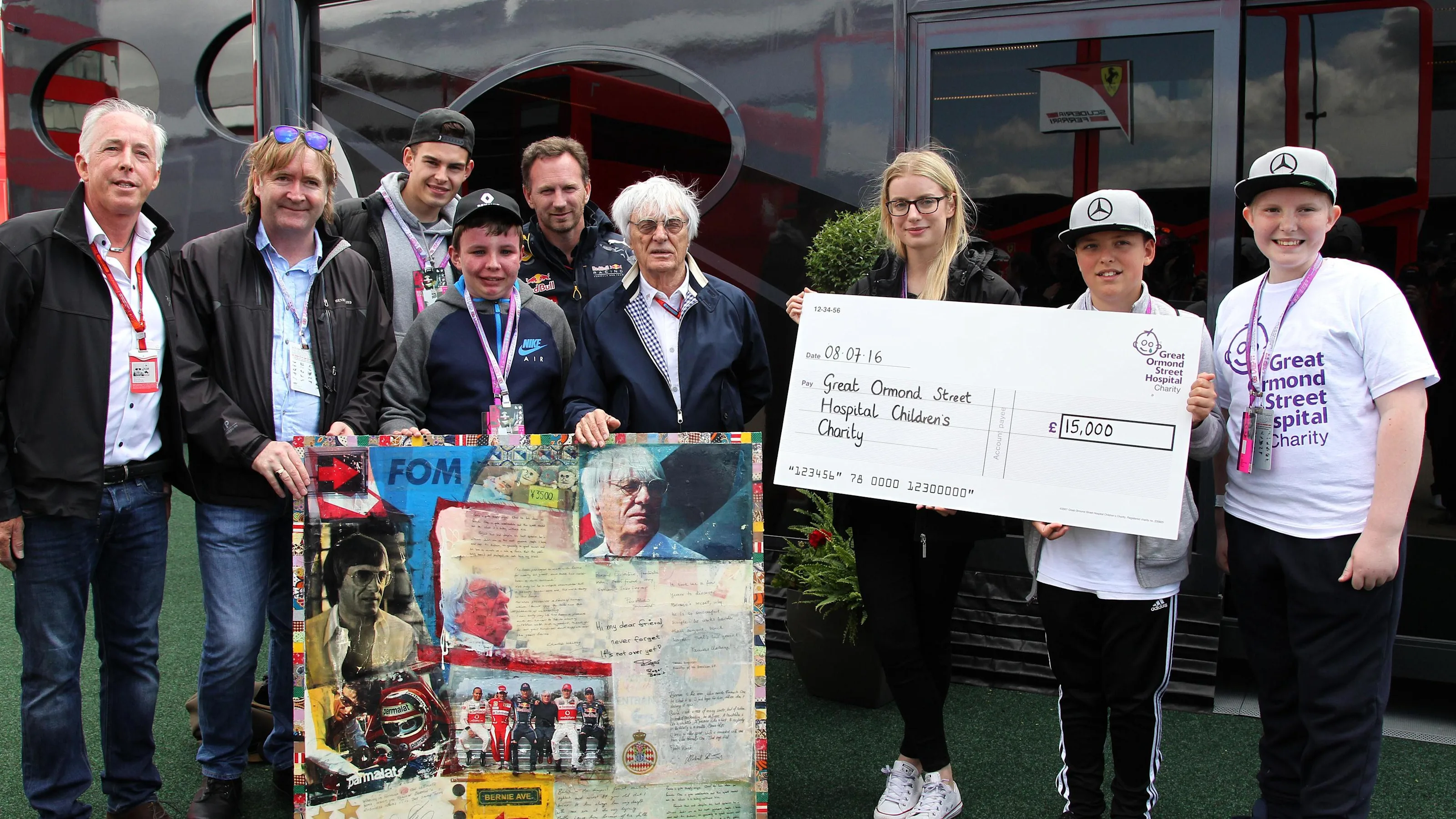 Keith Sutton (GBR) Sutton Images CEO and Mark Dickens (GBR) Artist with Bernie Ecclestone (GBR) CEO