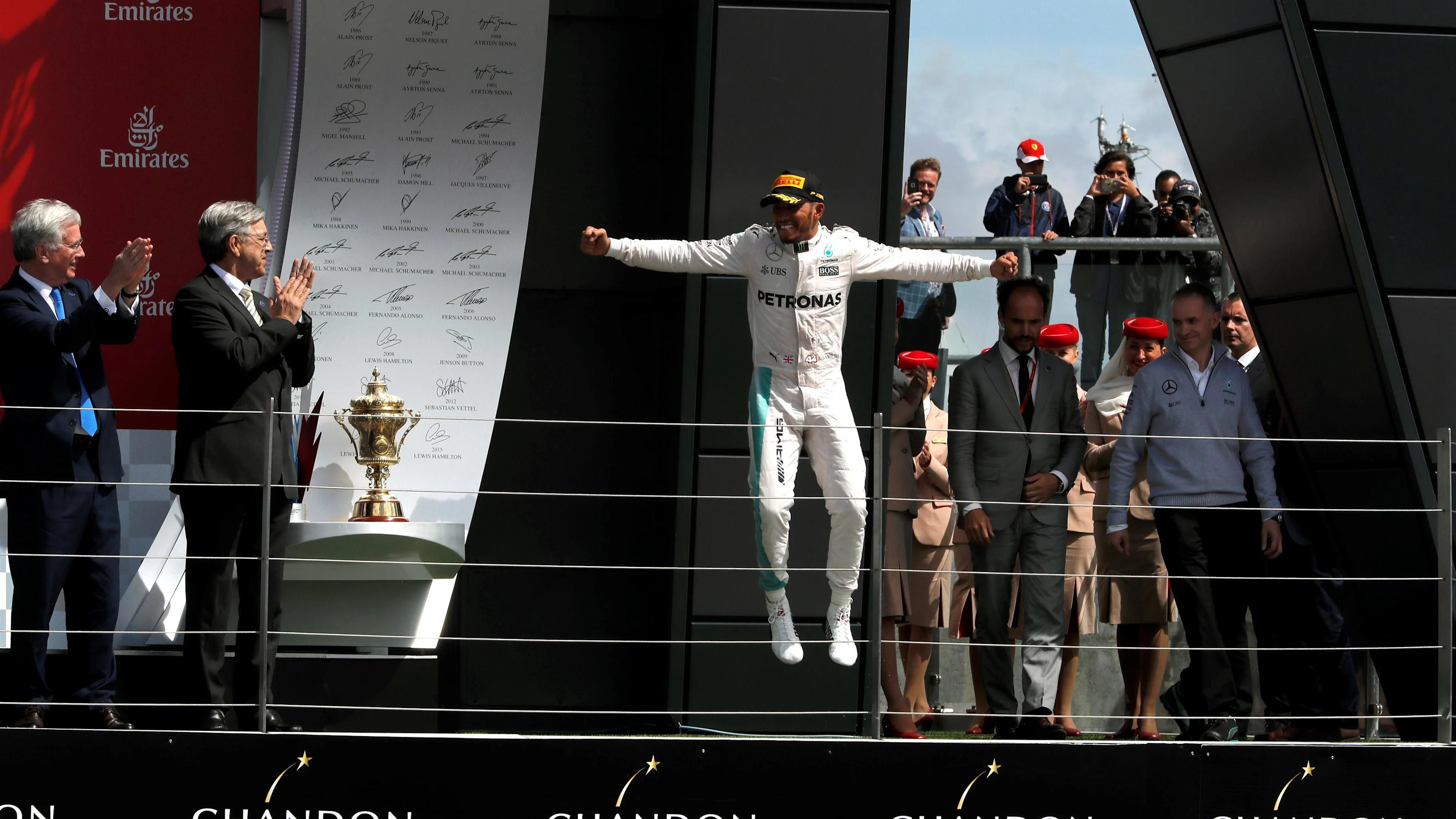 Race winner Lewis Hamilton (GBR) Mercedes AMG F1 celebrates on the podium at Formula One World