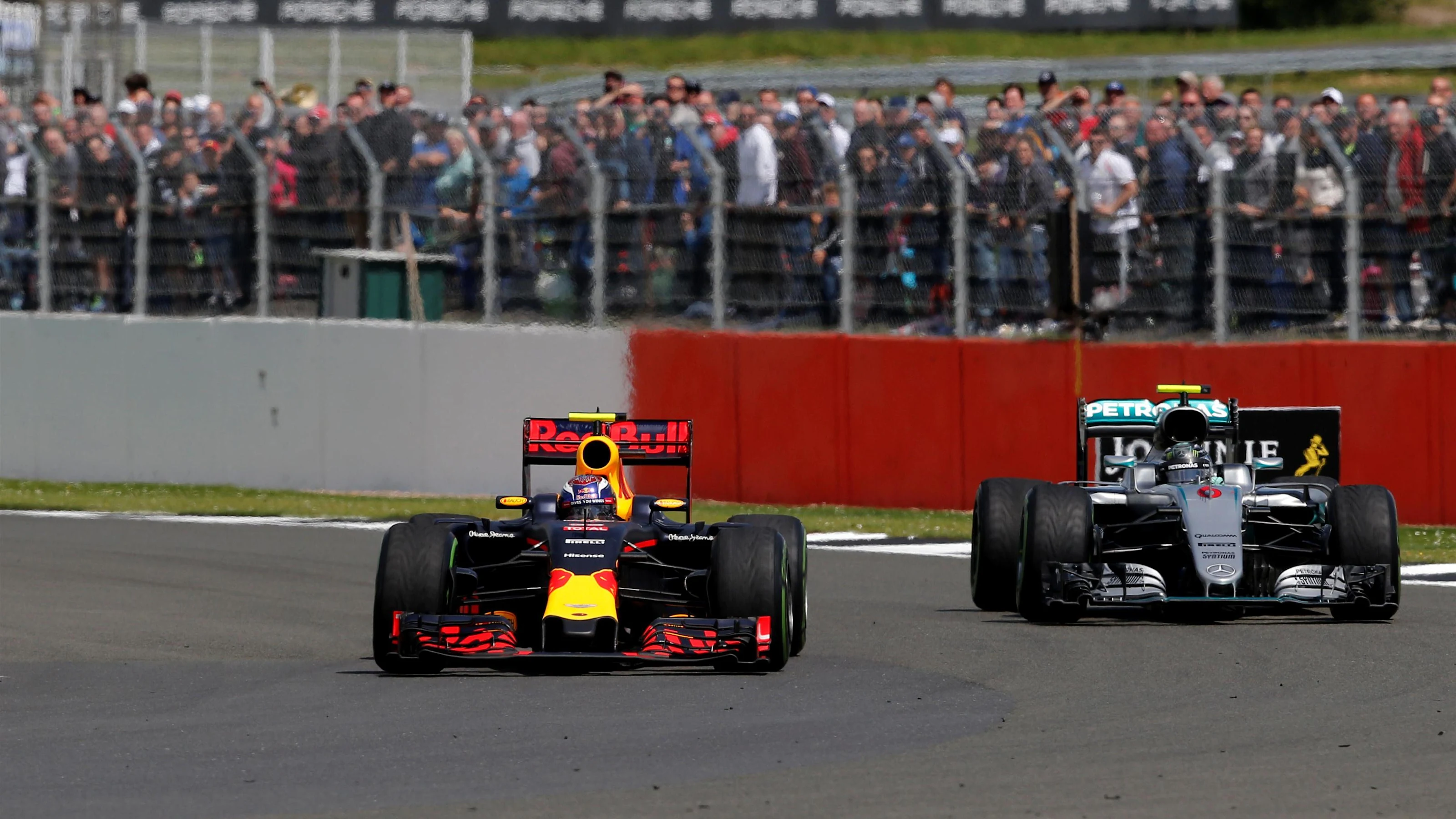 Max Verstappen (NED) Red Bull Racing RB12 AND Nico Rosberg (GER) Mercedes-Benz F1 W07 Hybrid BATTLE
