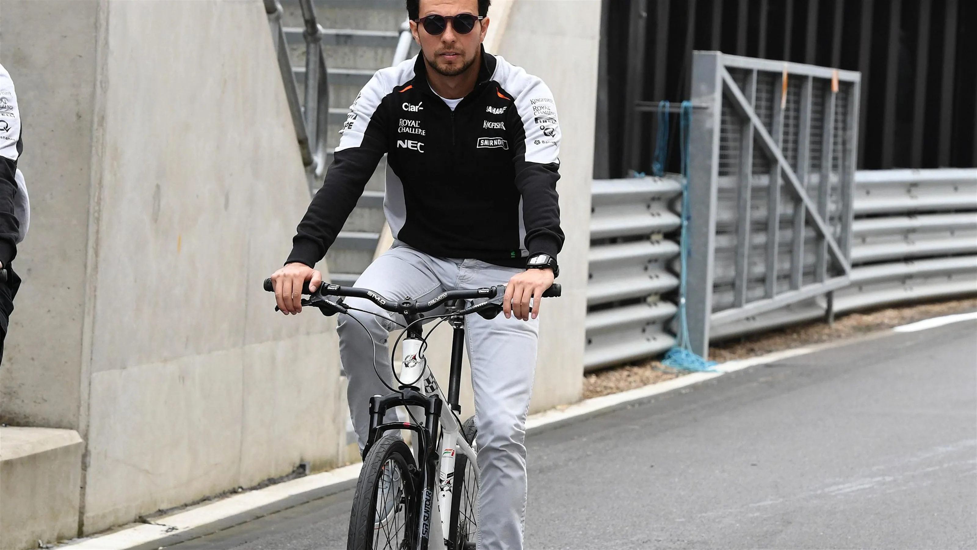 Sergio Perez (MEX) Force India on a bike at Formula One World Championship, Rd10, British Grand