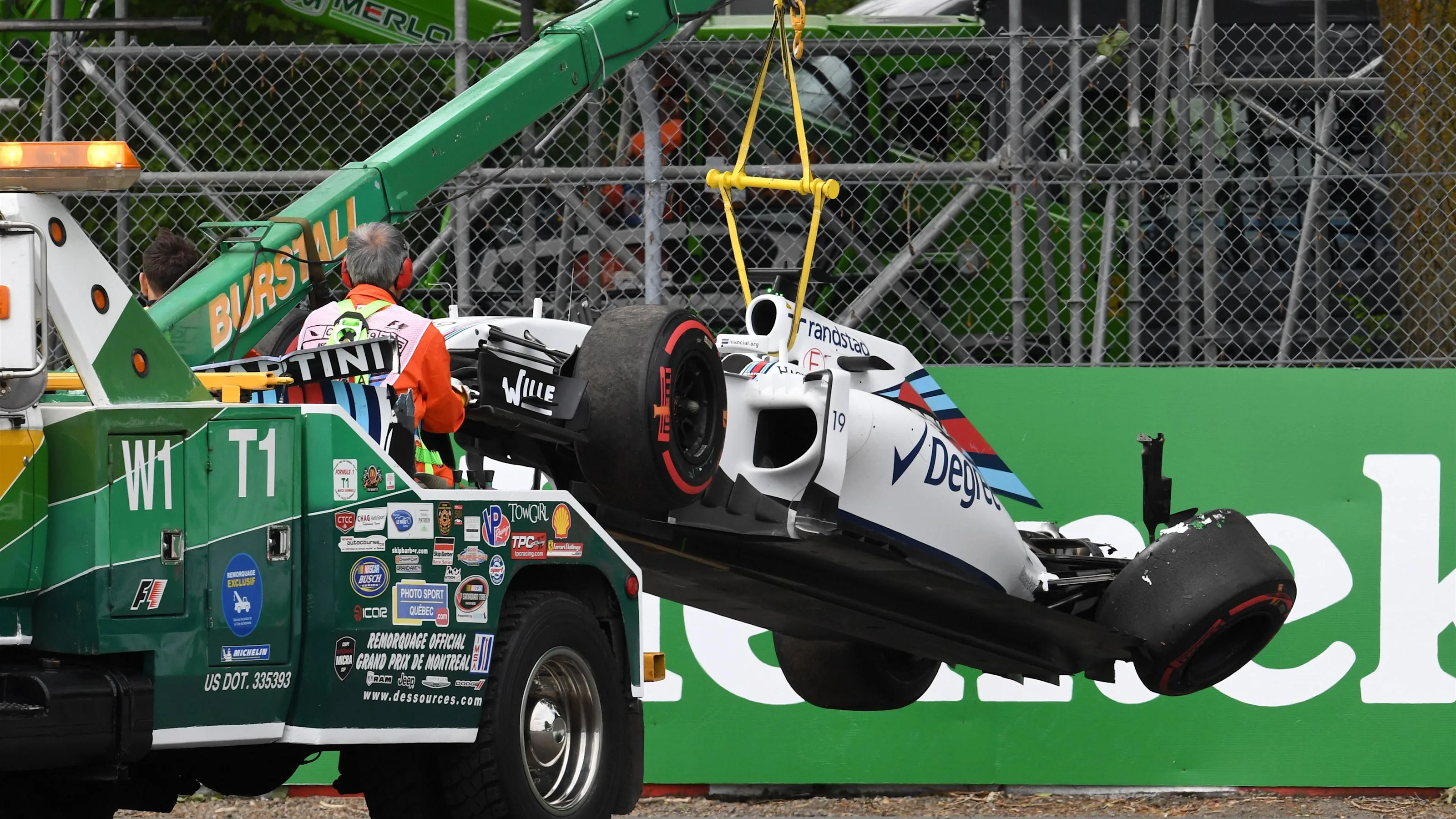 The crashed car of Felipe Massa (BRA) Williams FW38 is recovered in FP1 at Formula One World