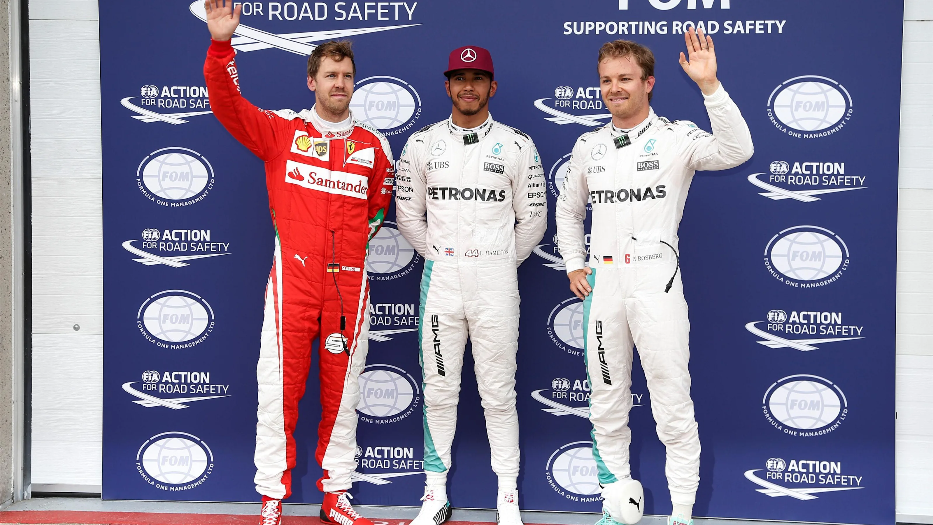 (L to R): Sebastian Vettel (GER) Ferrari, pole sitter Lewis Hamilton (GBR) Mercedes AMG F1 and Nico
