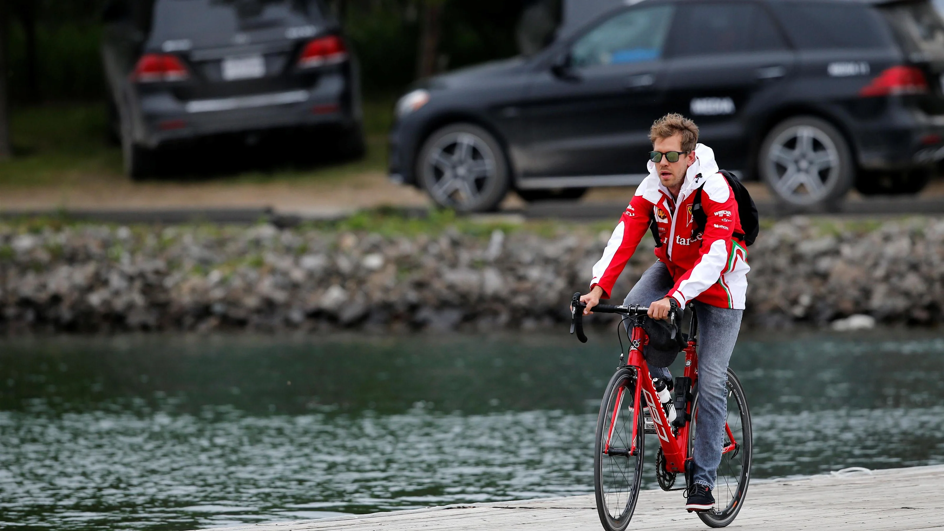 Sebastian Vettel (GER) Ferrari on a bike at Formula One World Championship, Rd7, Canadian Grand