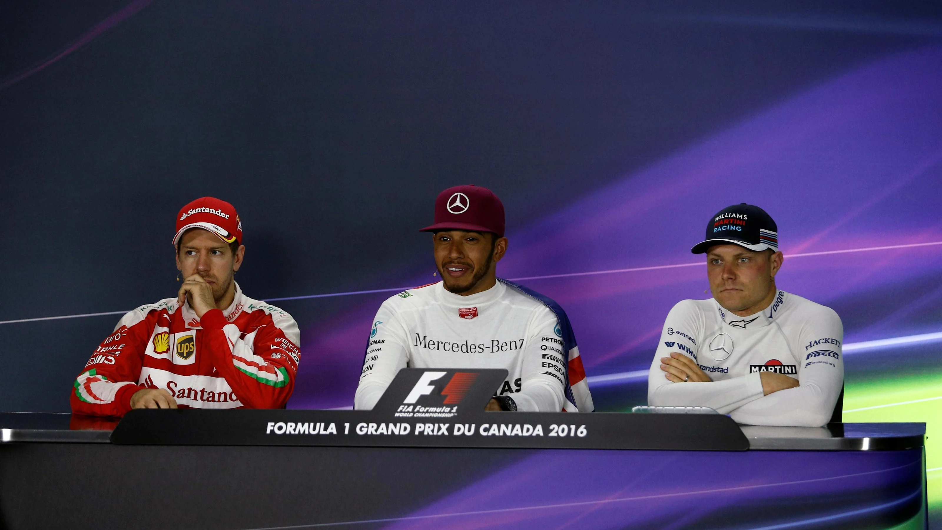 (L to R): Sebastian Vettel (GER) Ferrari, race winner Lewis Hamilton (GBR) Mercedes AMG F1 and