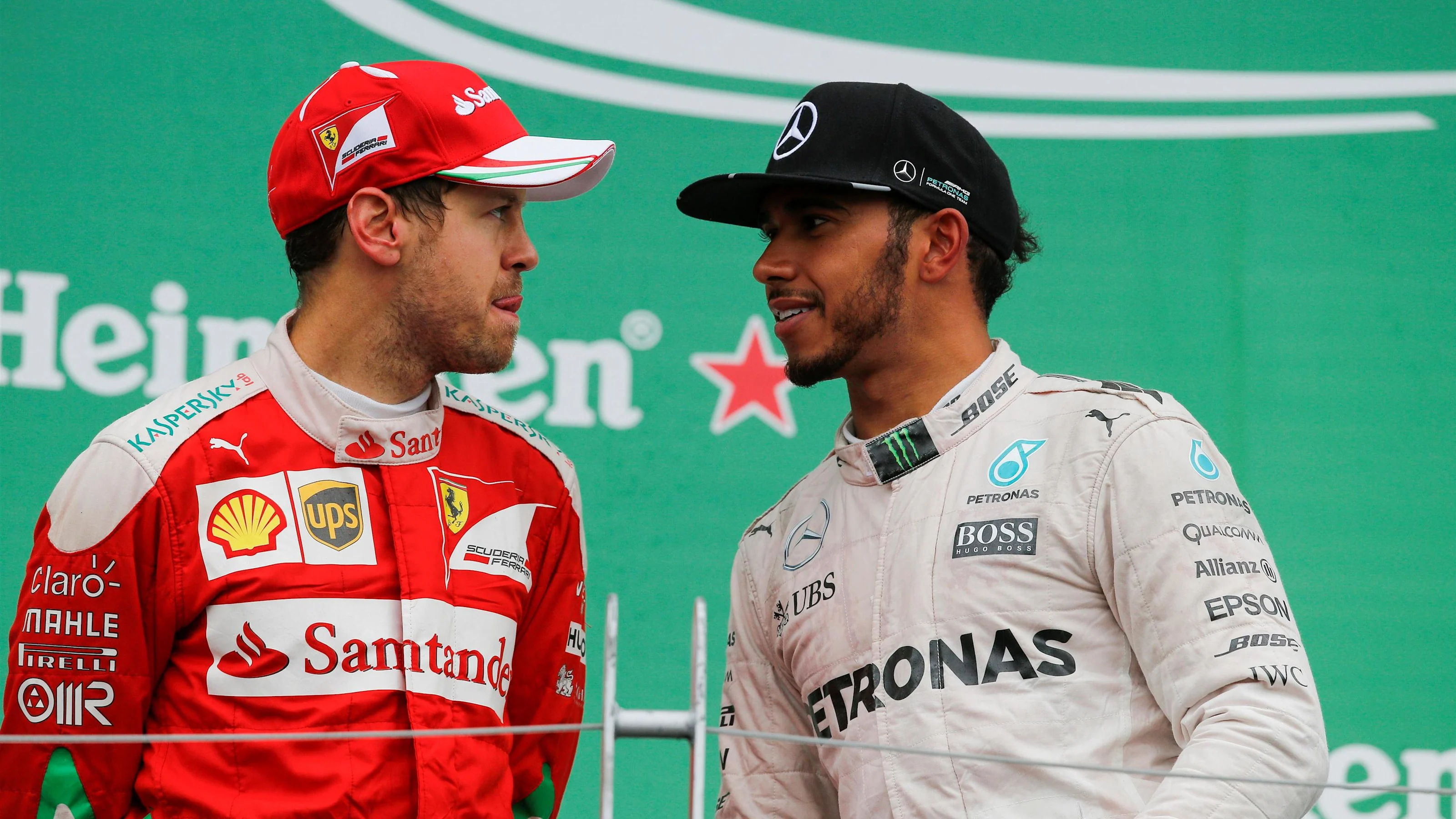 Sebastian Vettel (GER) Ferrari and race winner Lewis Hamilton (GBR) Mercedes AMG F1 celebrate on