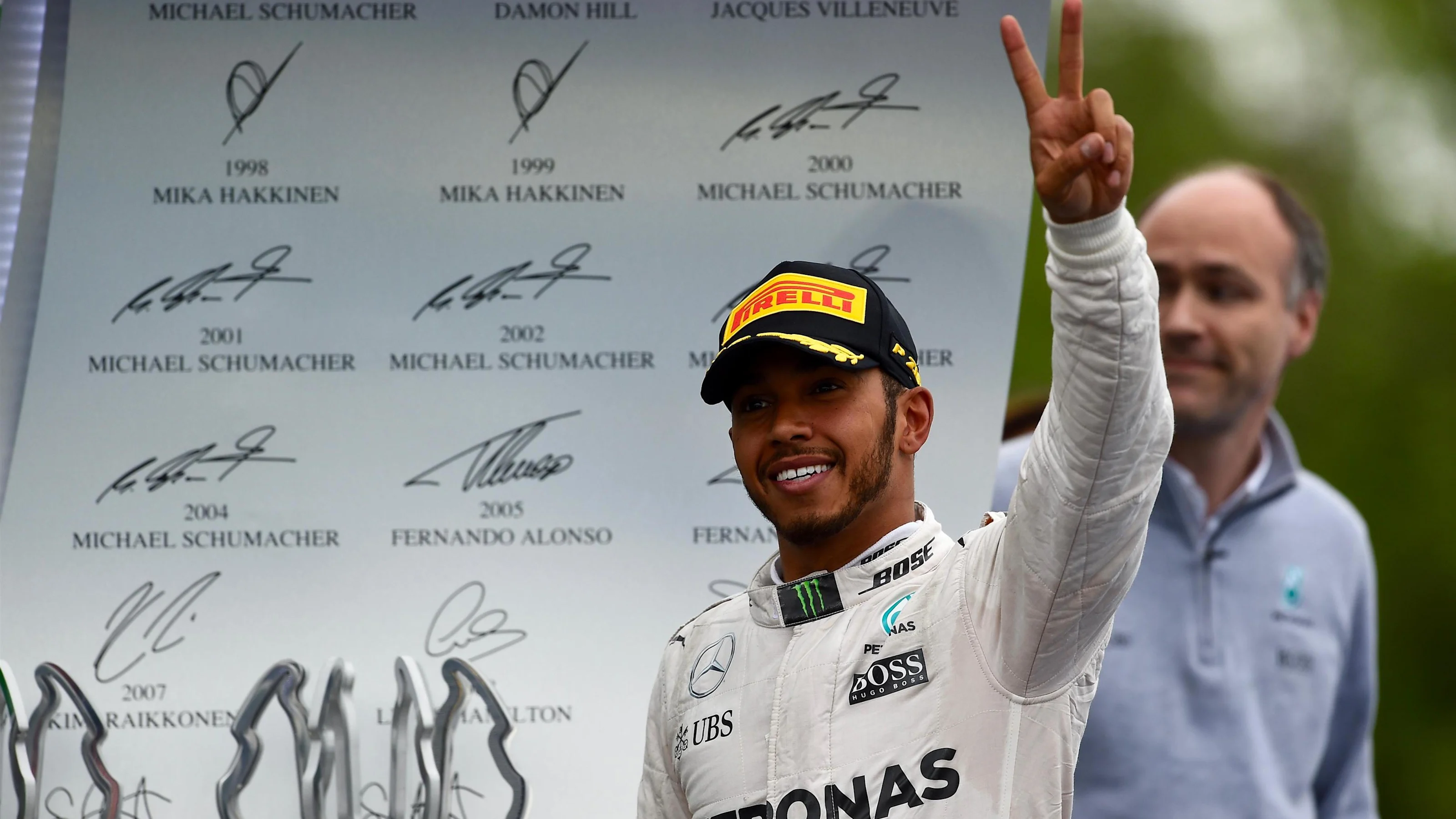 Race winner Lewis Hamilton (GBR) Mercedes AMG F1 celebrates on the podium at Formula One World