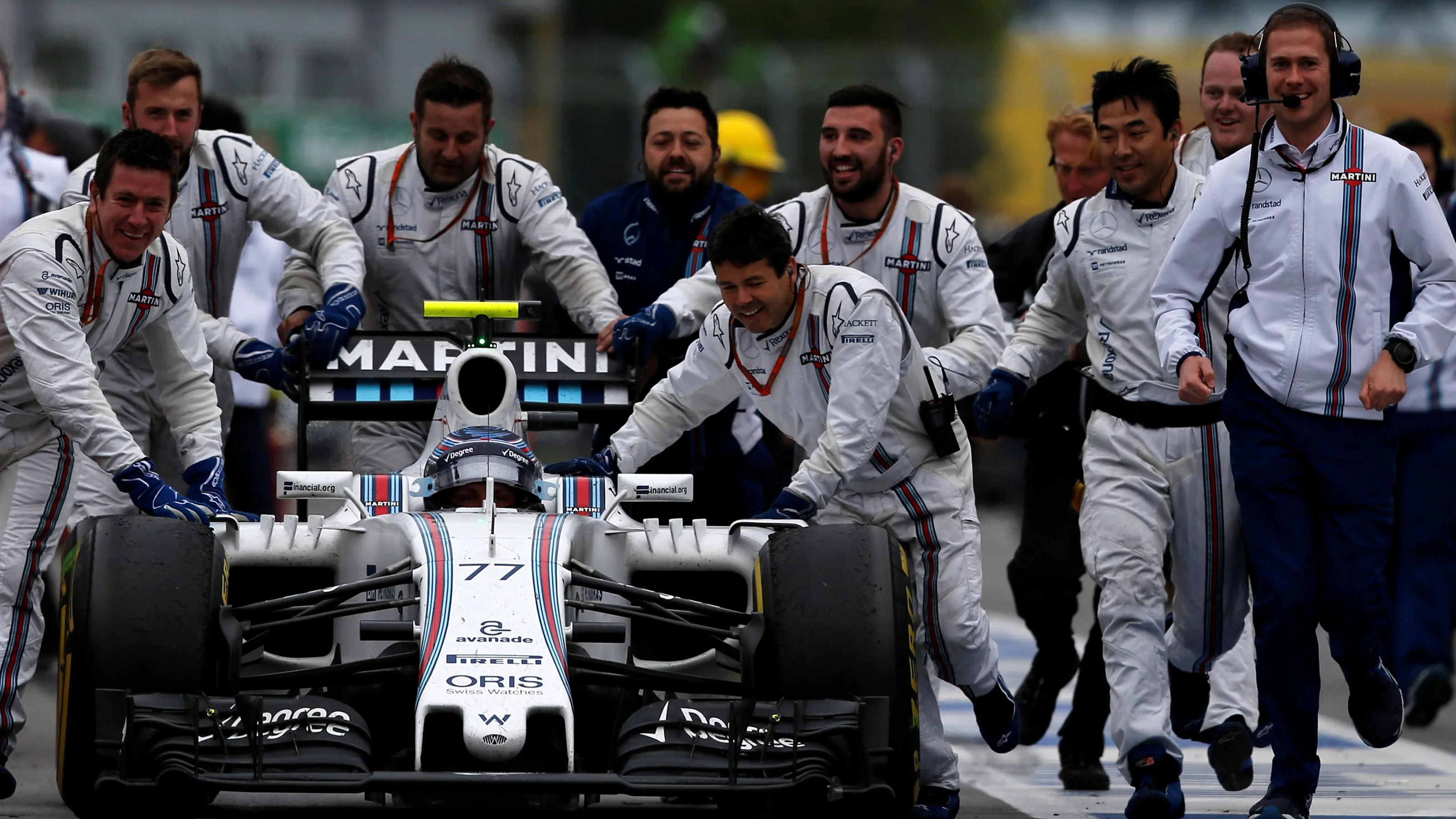 Third placed Valtteri Bottas (FIN) Williams FW38 is pushed into parc ferme at Formula One World