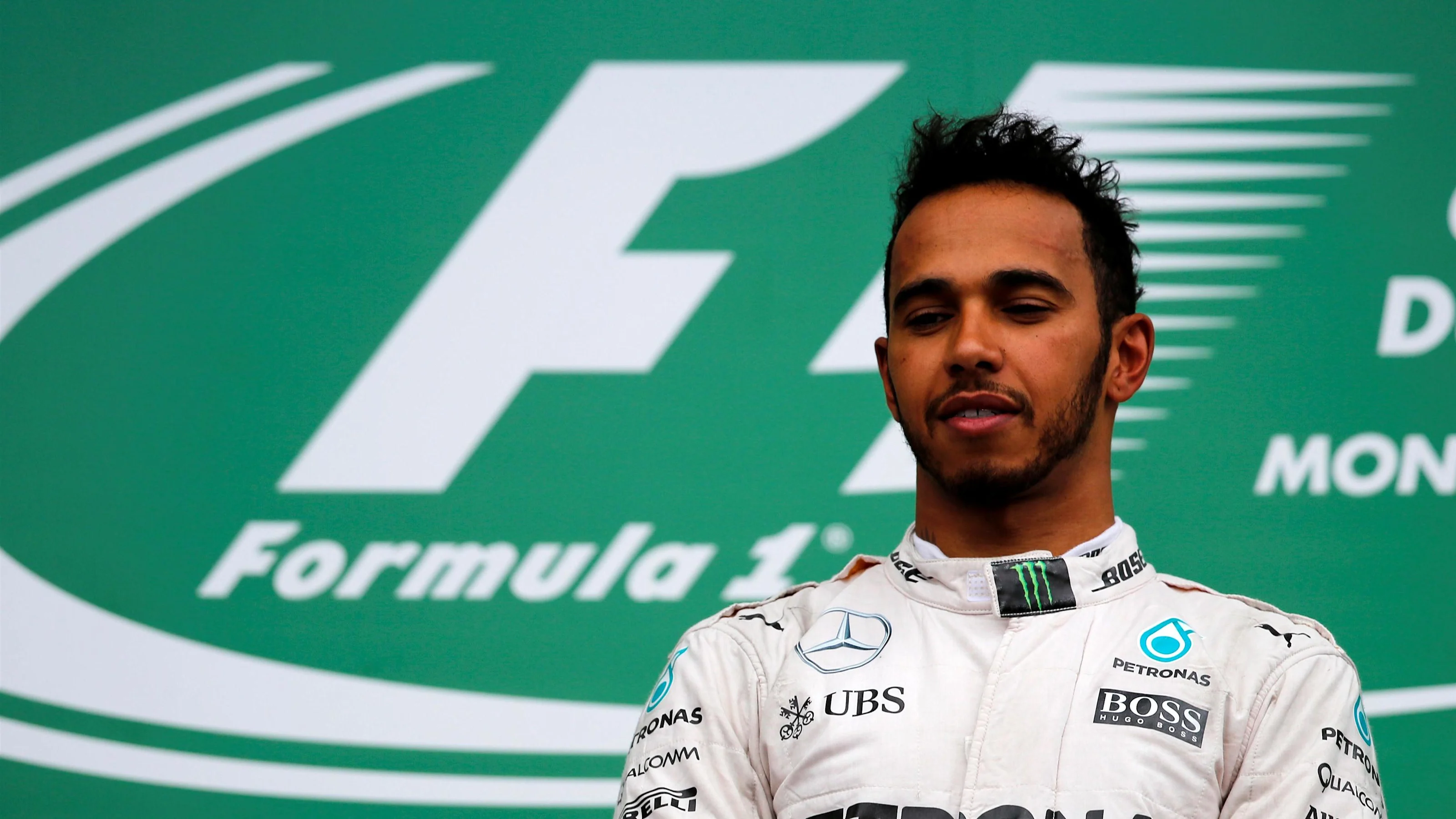 Race winner Lewis Hamilton (GBR) Mercedes AMG F1 celebrateson the podium at Formula One World