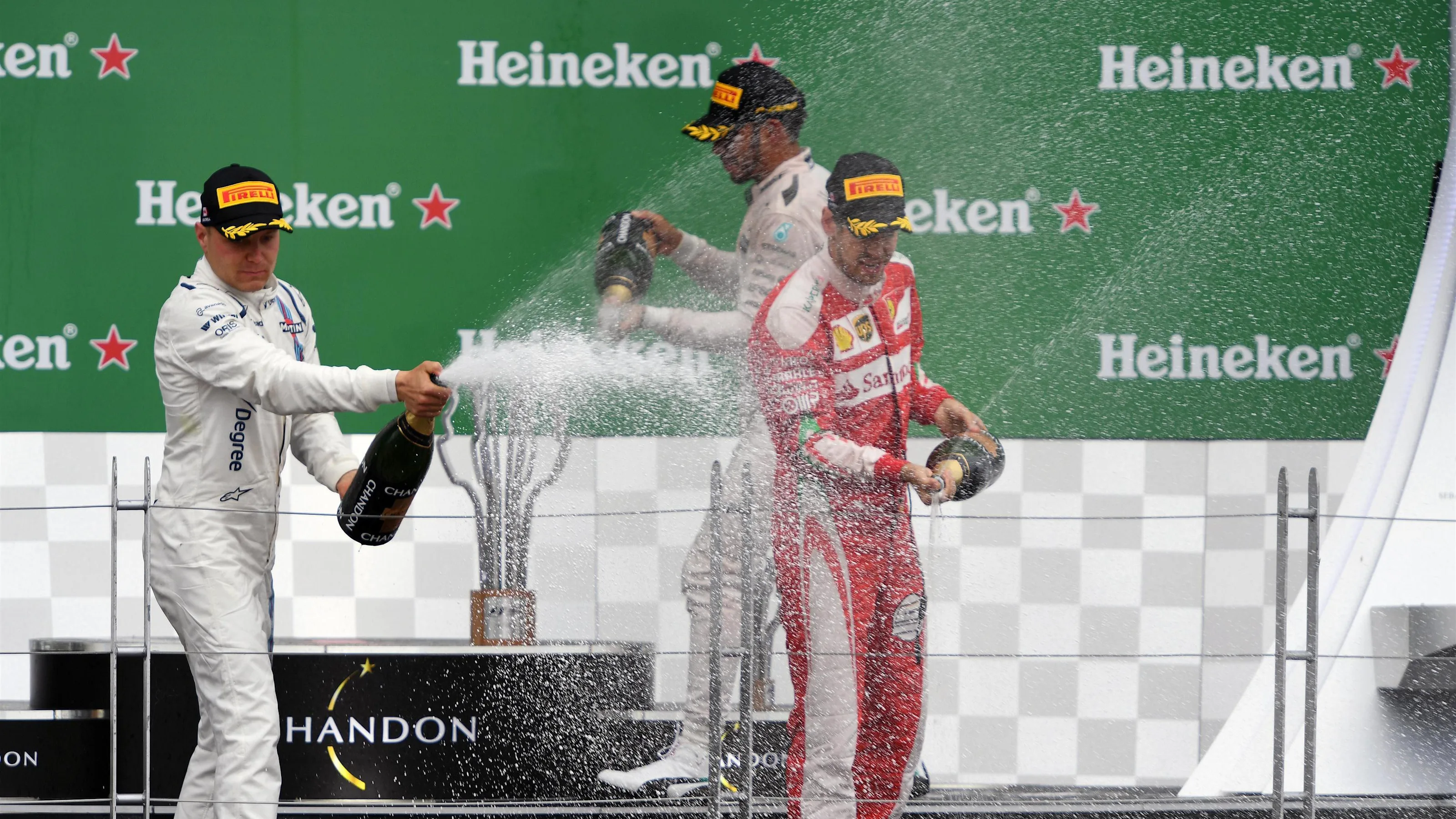 Valtteri Bottas (FIN) Williams, Lewis Hamilton (GBR) Mercedes AMG F1 and Sebastian Vettel (GER)
