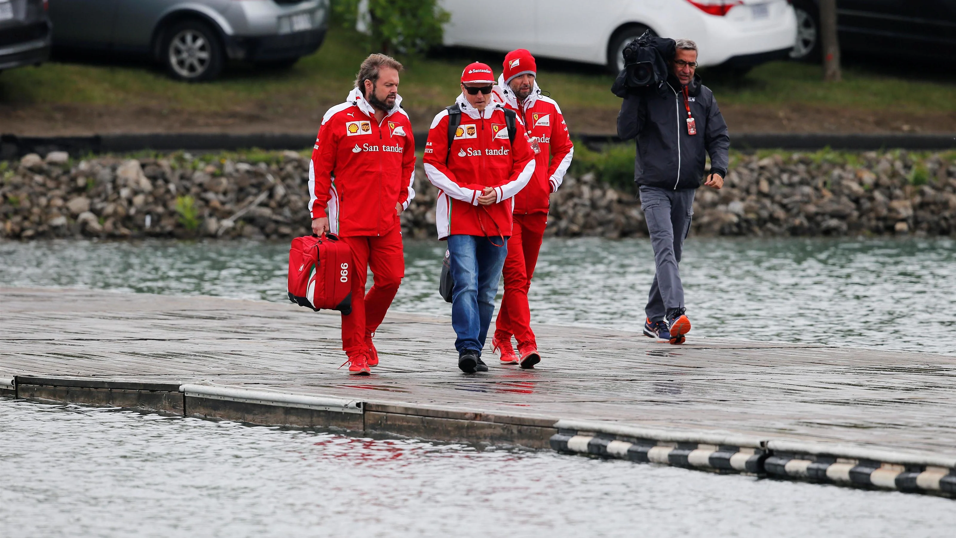 Gino Rosato (CDN) Ferrari and Kimi Raikkonen (FIN) Ferrari at Formula One World Championship, Rd7,