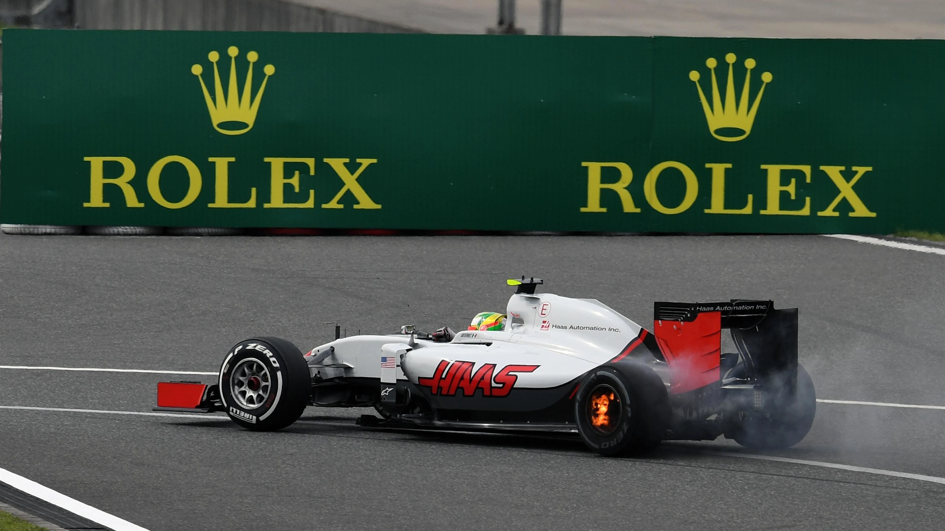 Esteban Gutierrez (MEX) Haas VF-16 with his rear brakes on fire in FP2 at Formula One World