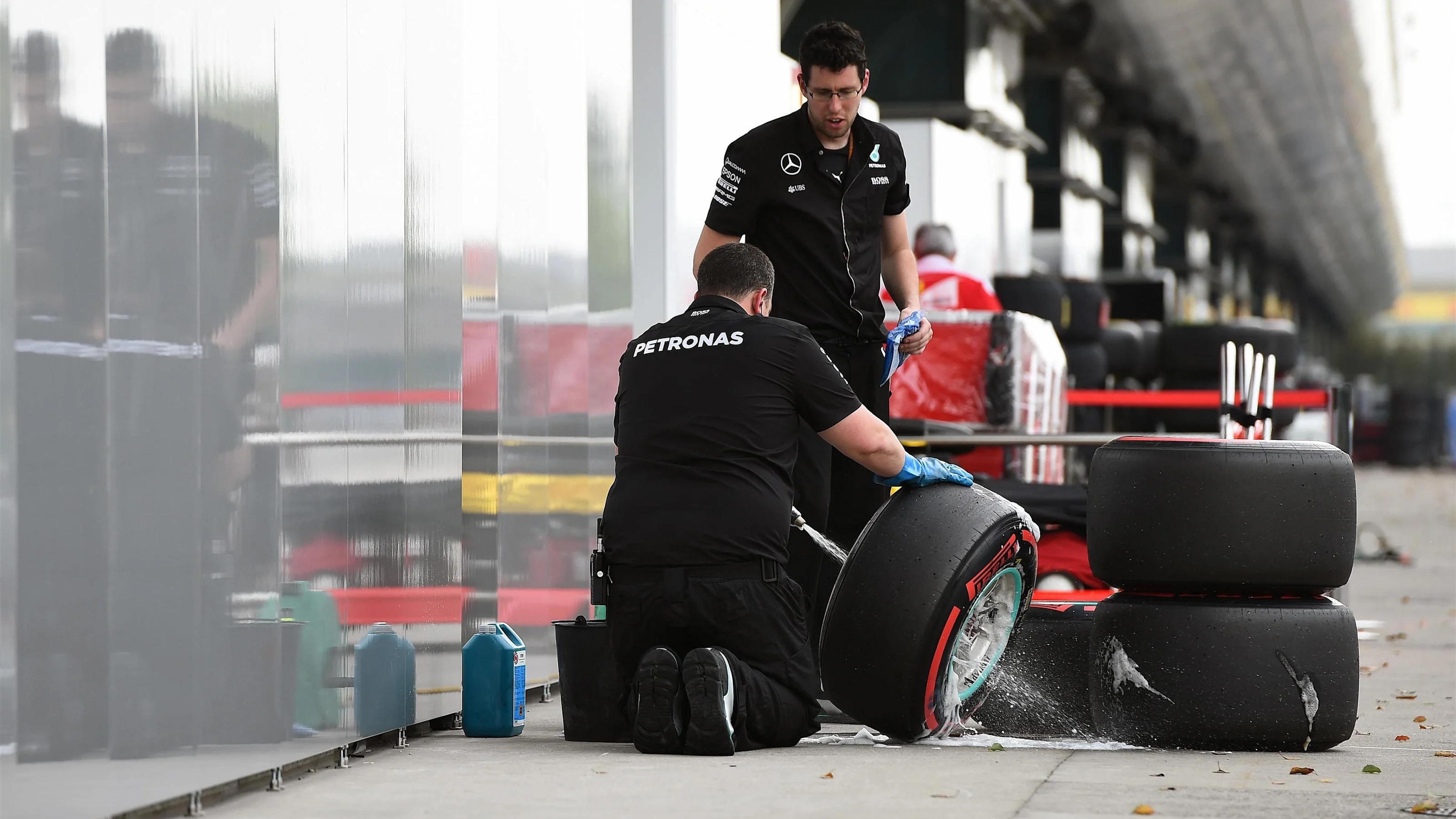 Mercedes AMG F1 mechanics with Pirelli tyres at Formula One World Championship, Rd3, Chinese Grand