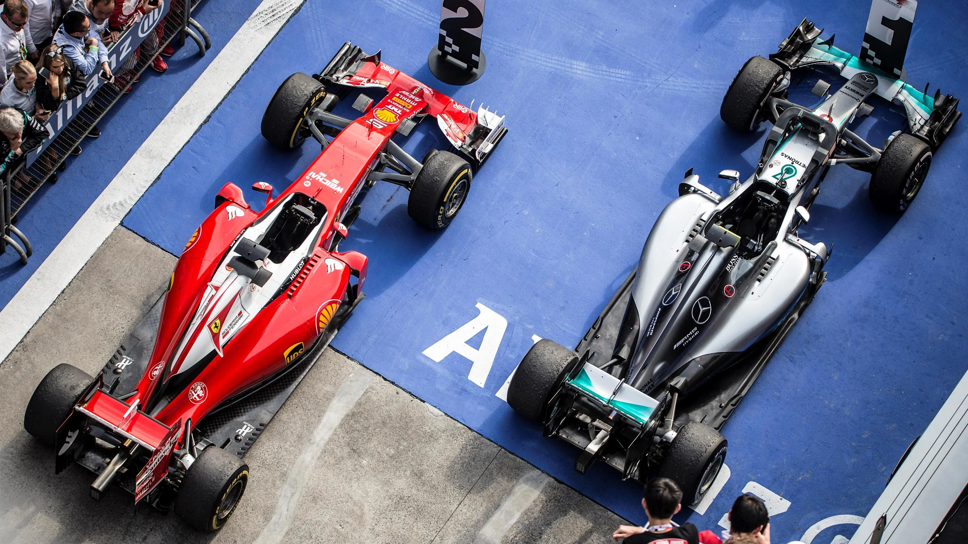 The cars of race winner Nico Rosberg (GER) Mercedes-Benz F1 W07 Hybrid and Sebastian Vettel (GER)