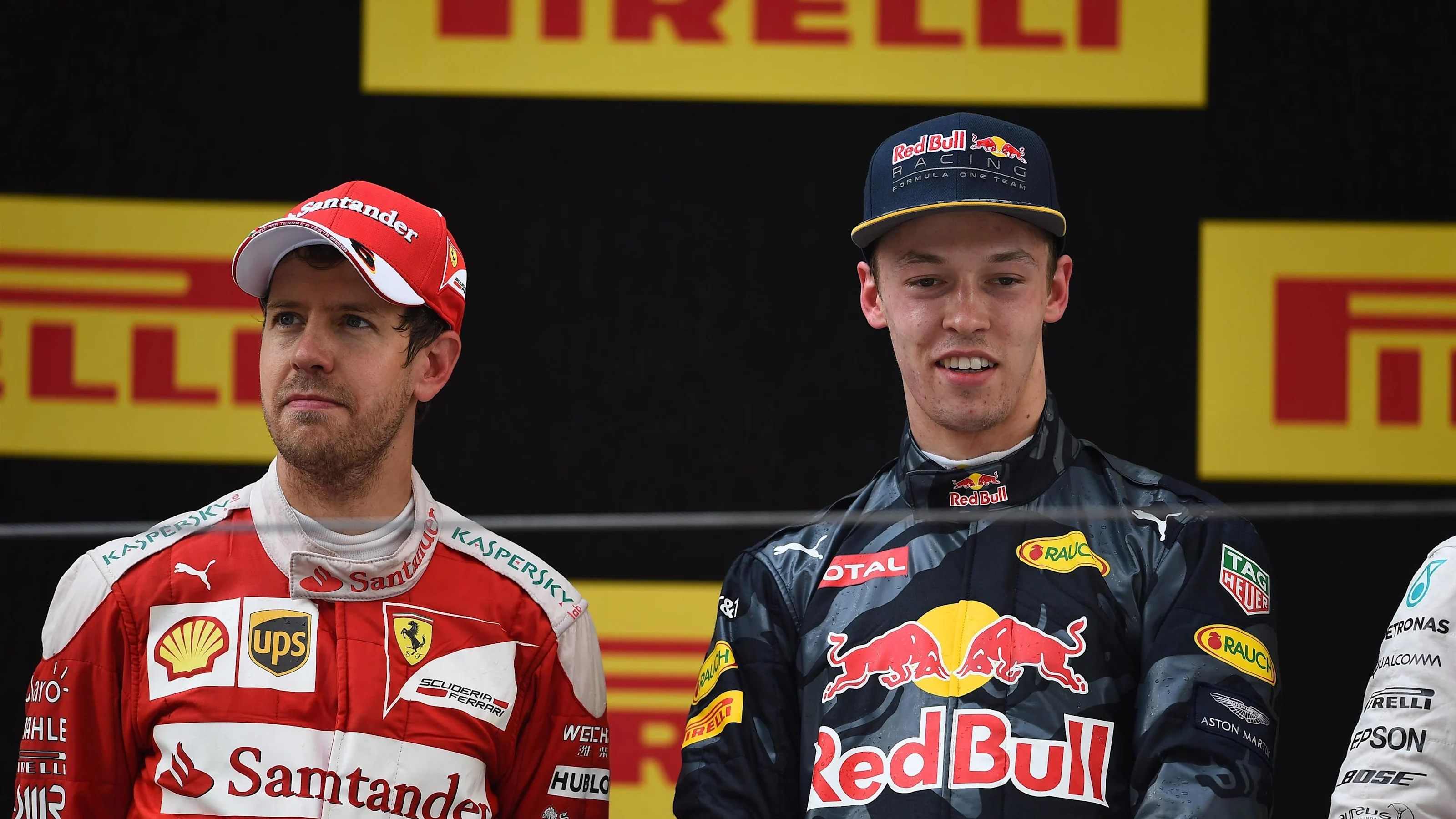 Sebastian Vettel (GER) Ferrari and Daniil Kvyat (RUS) Red Bull Racing on the podium at Formula One