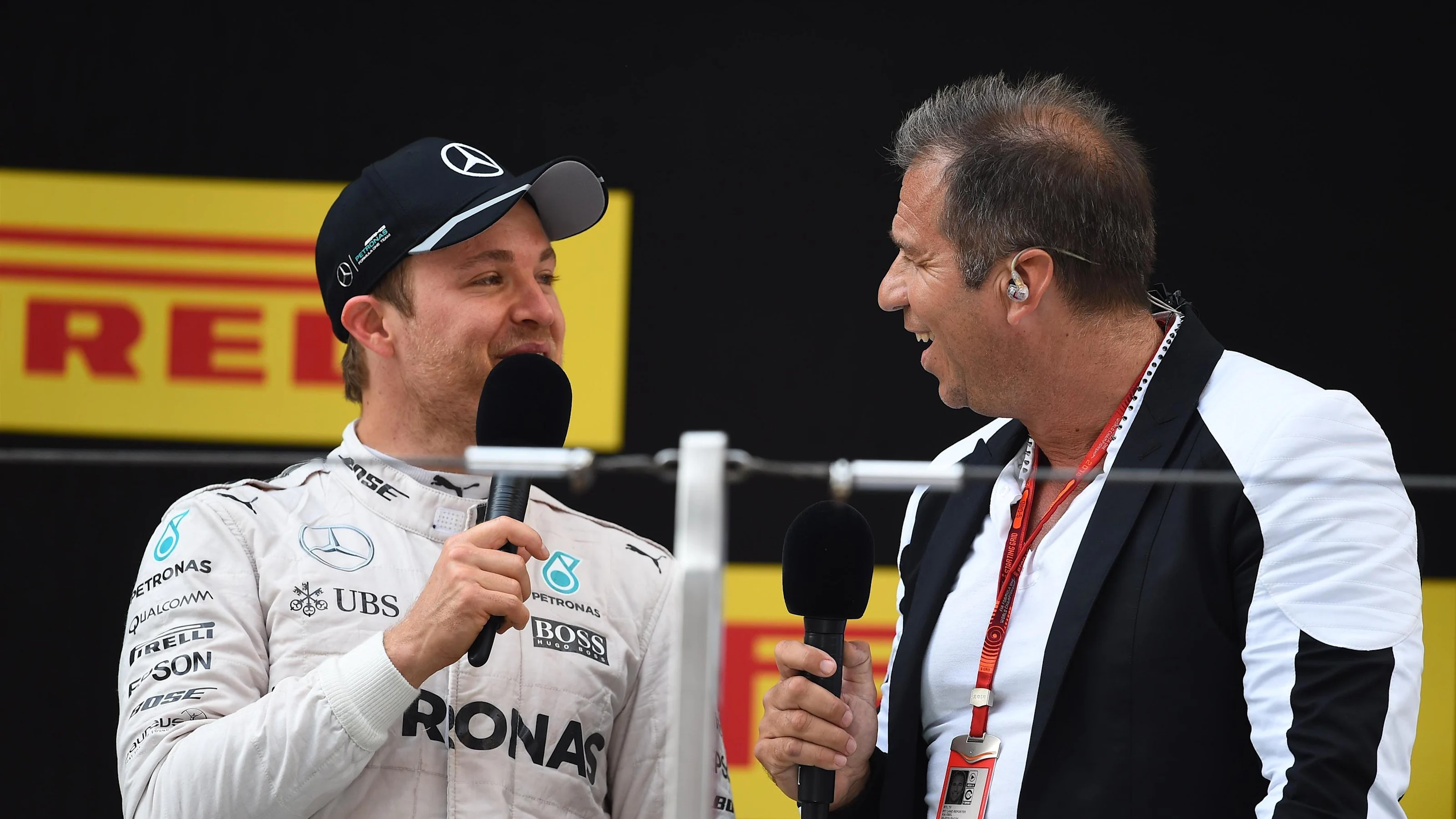 Race winner Nico Rosberg (GER) Mercedes AMG F1 and Kai Ebel (GER) RTL Presenter on the podium at