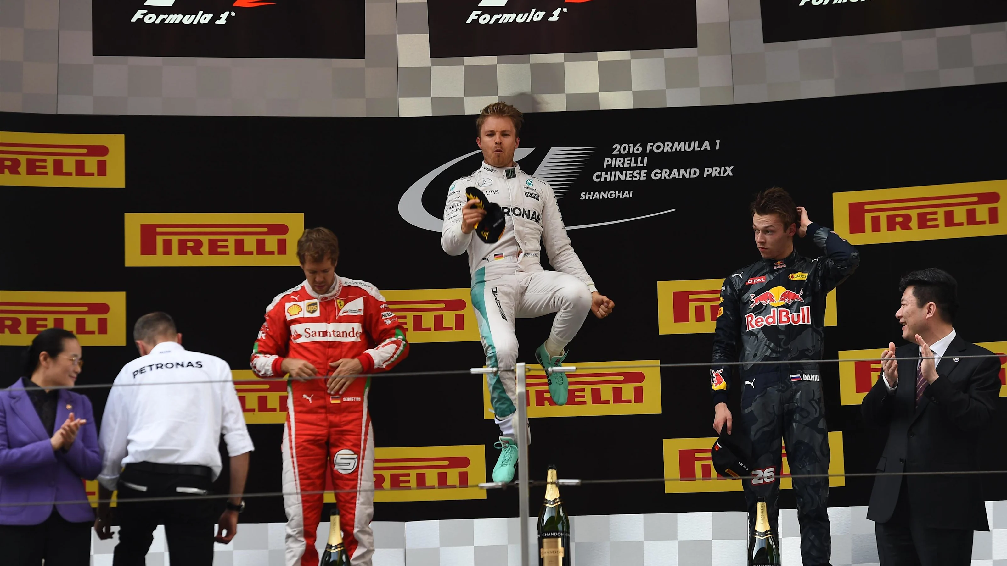 Sebastian Vettel (GER) Ferrari, Nico Rosberg (GER) Mercedes AMG F1 and Daniil Kvyat (RUS) Red Bull