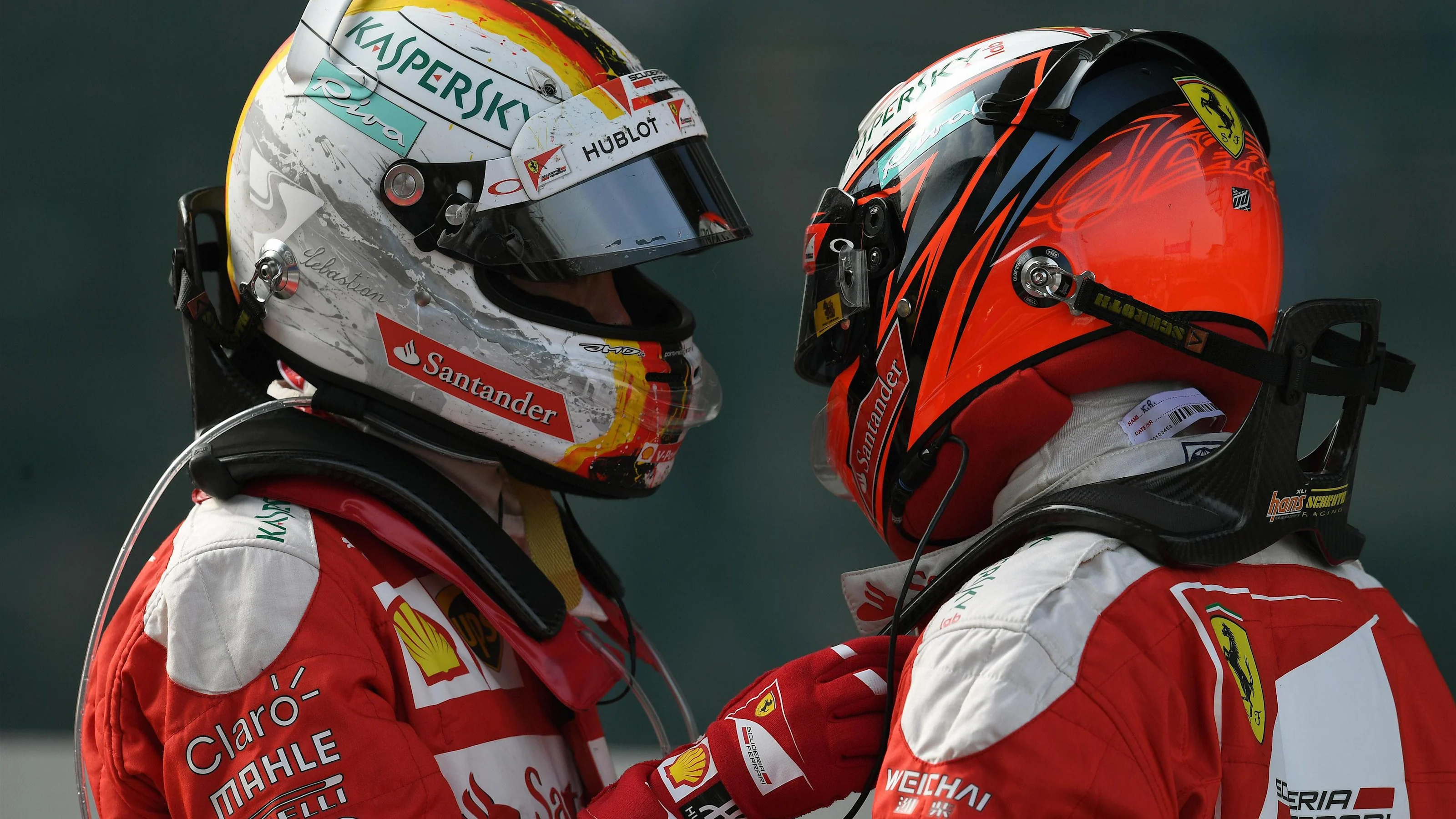 Sebastian Vettel (GER) Ferrari and Kimi Raikkonen (FIN) Ferrari in parc ferme at Formula One World