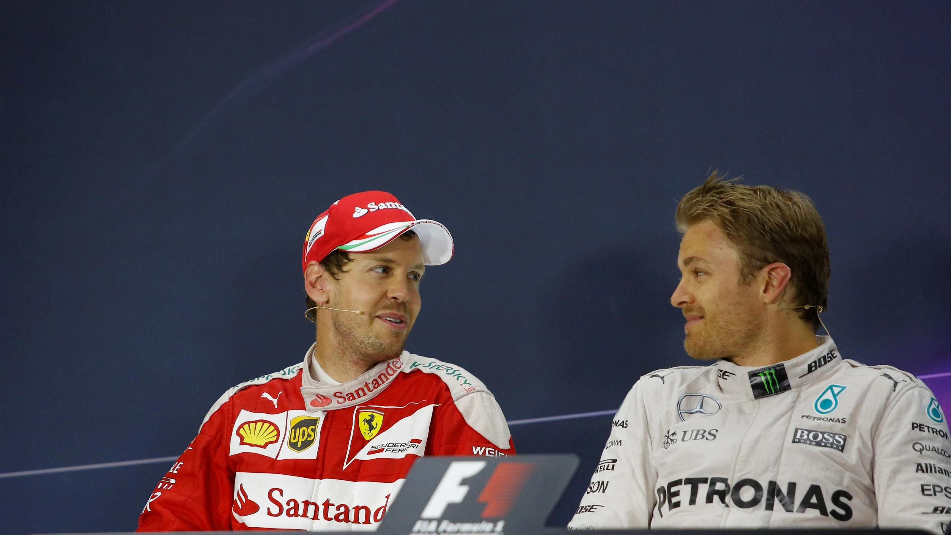 Sebastian Vettel (GER) Ferrari and Nico Rosberg (GER) Mercedes AMG F1 in the Press Conference at