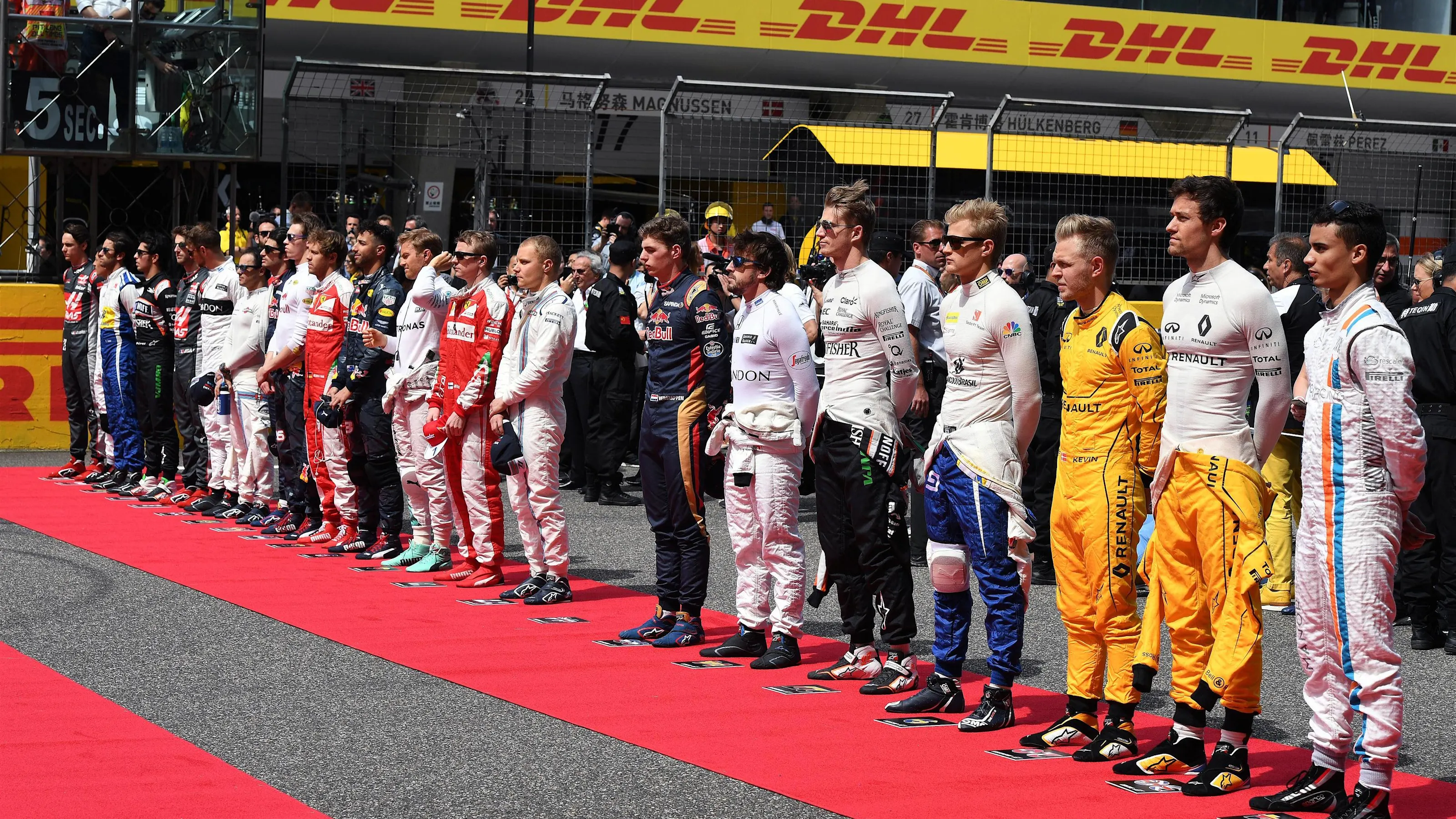 Drivers observe the Natioanal Anthem on the grid at Formula One World Championship, Rd3, Chinese