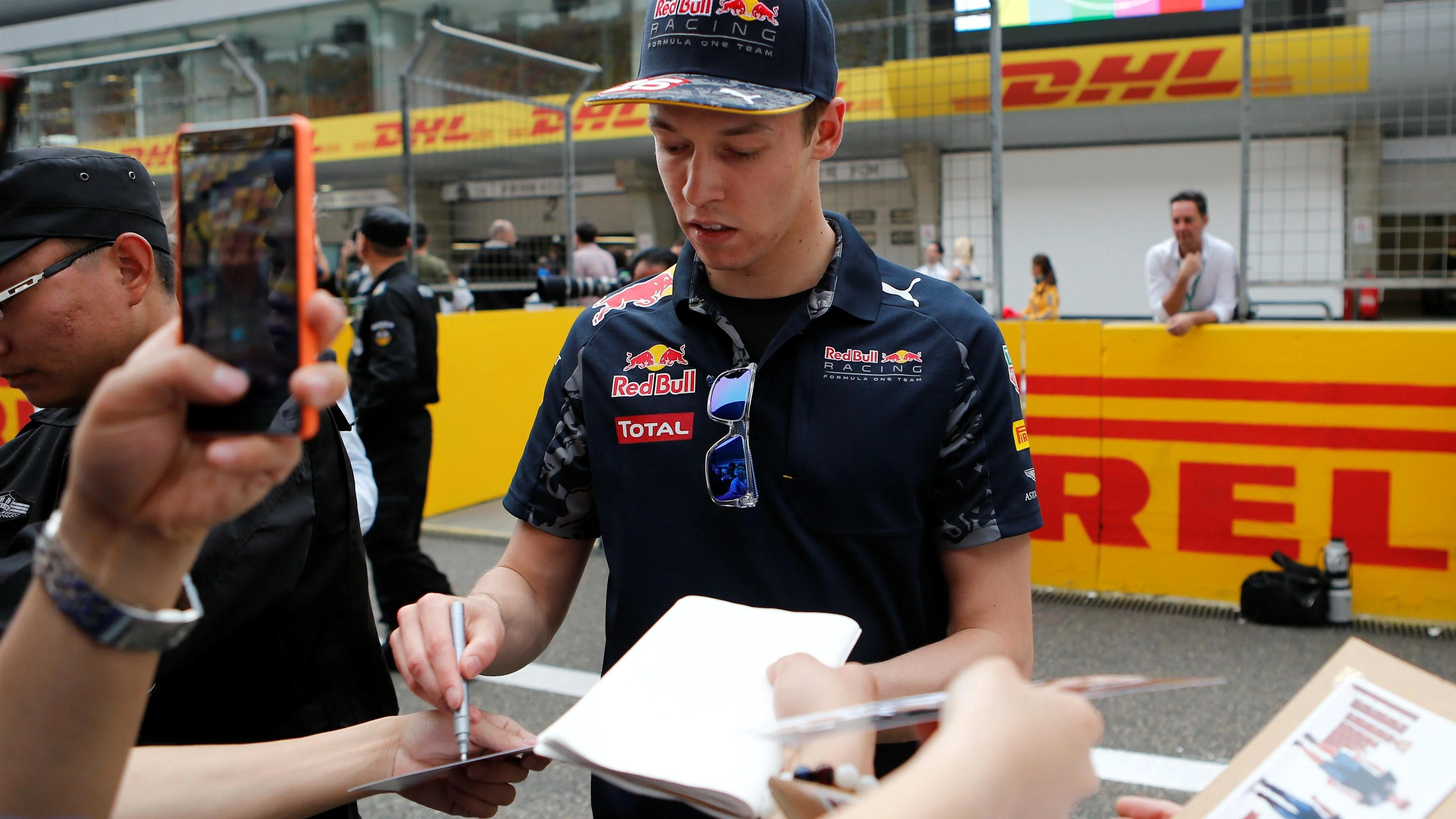 Daniil Kyvat (RUS) Red Bull Racing signs autographs for the fans at Formula One World Championship,