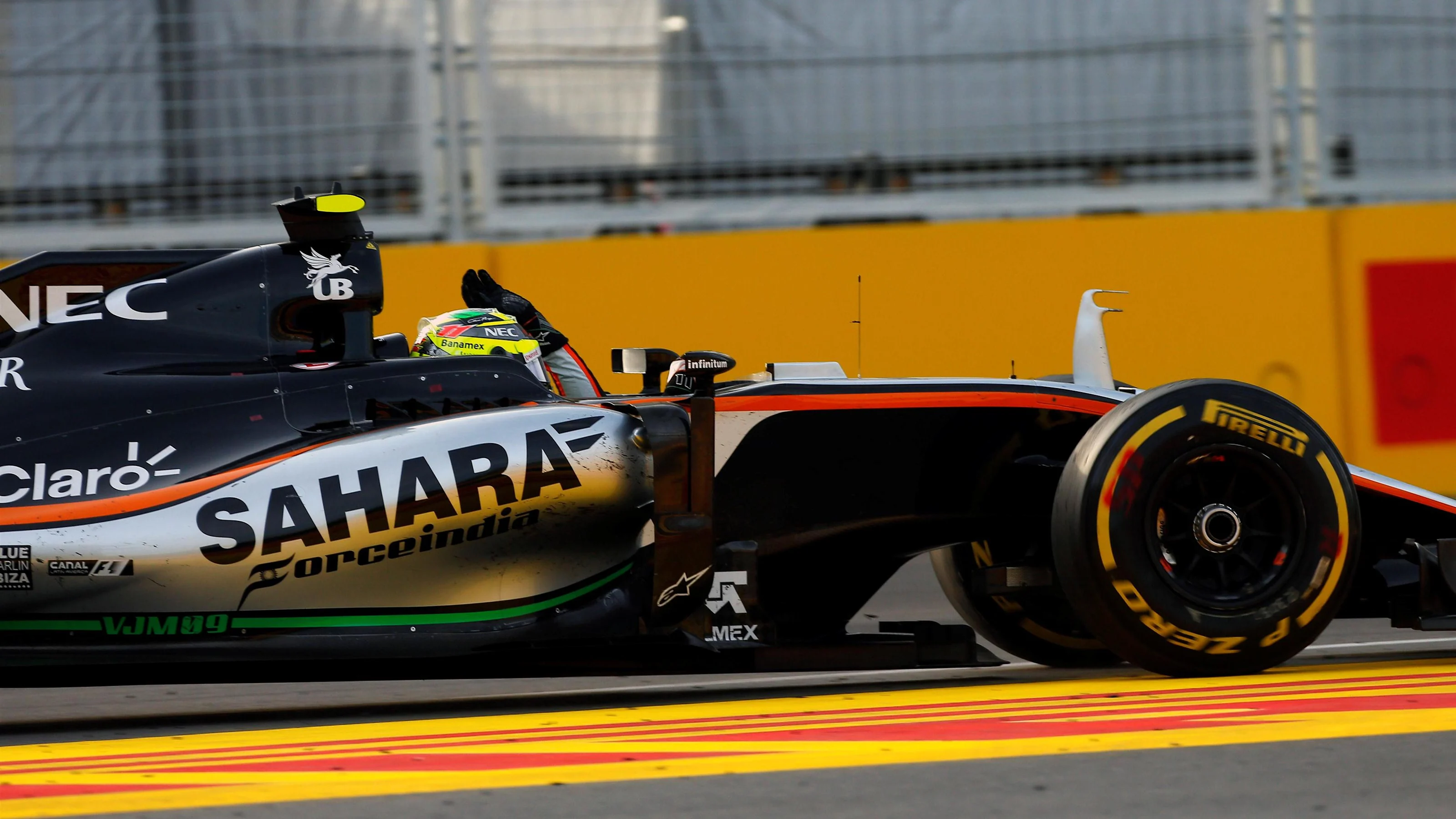 Sergio Perez (MEX) Force India VJM09 celebrates at the end of the race at Formula One World