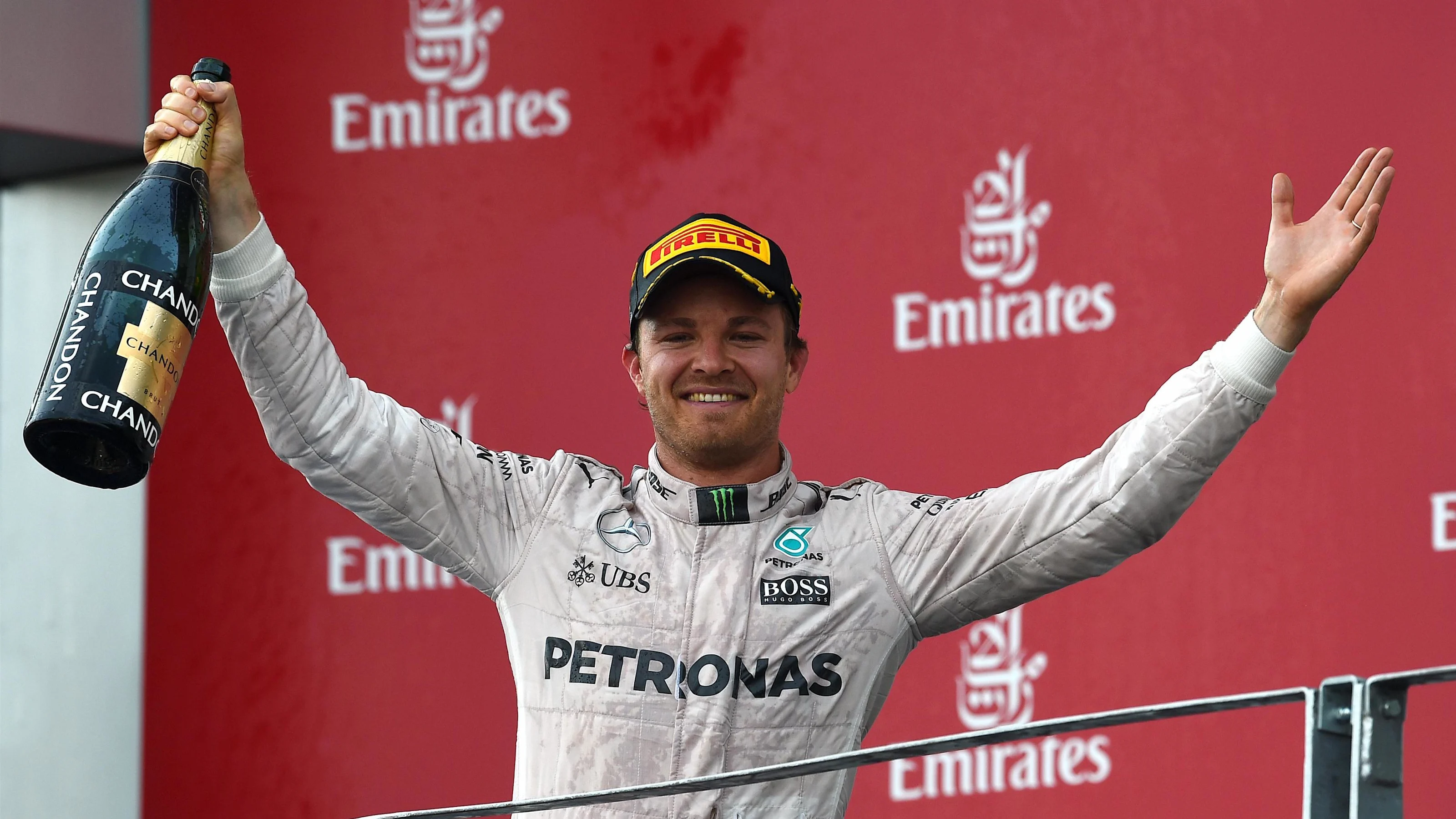 Race winner Nico Rosberg (GER) Mercedes AMG F1 celebrates on the podium with the champagne at