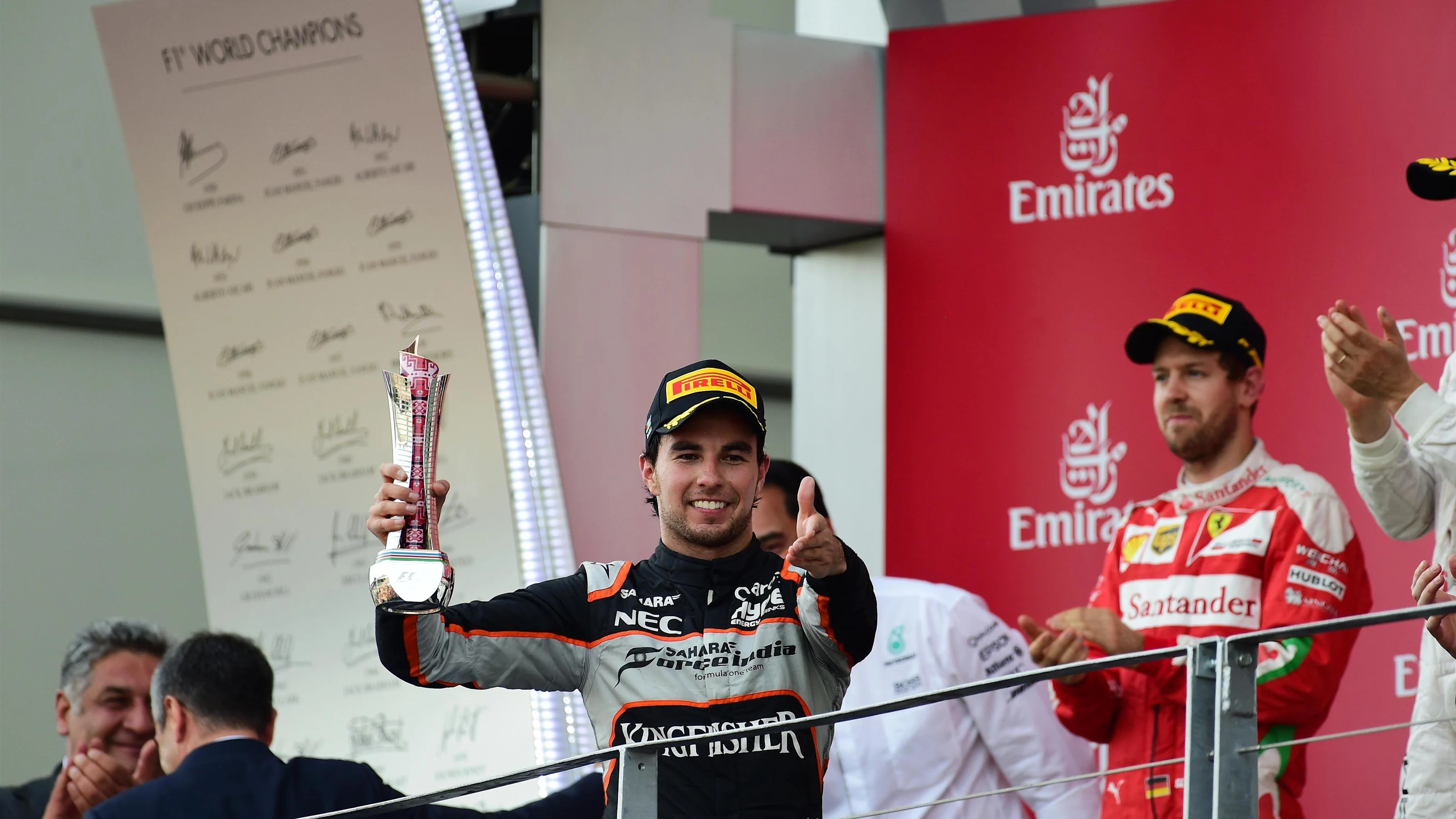 Sergio Perez (MEX) Force India celebrates on the podium at Formula One World Championship, Rd8,