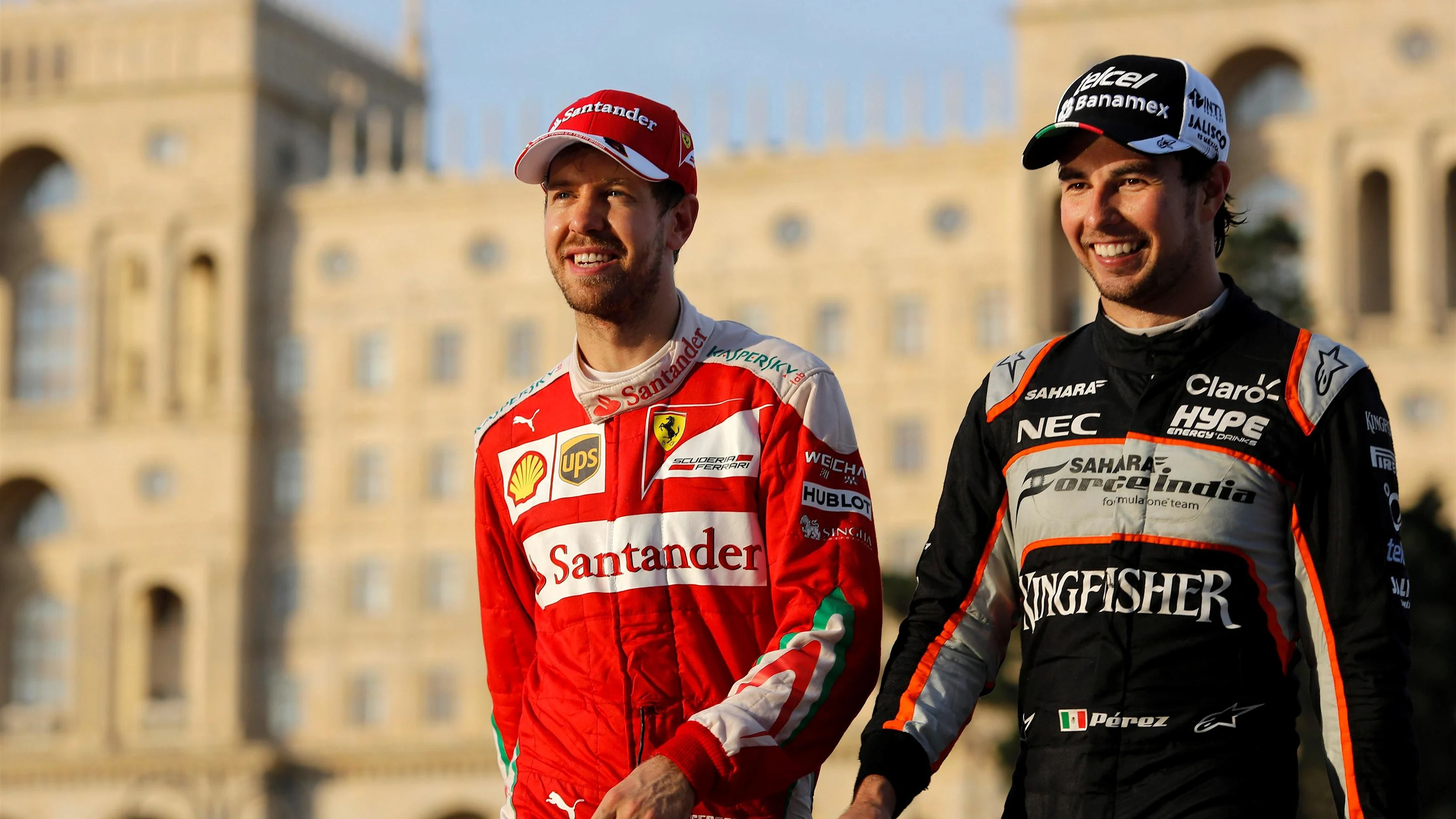 Sebastian Vettel (GER) Ferrari and Sergio Perez (MEX) Force India at Formula One World