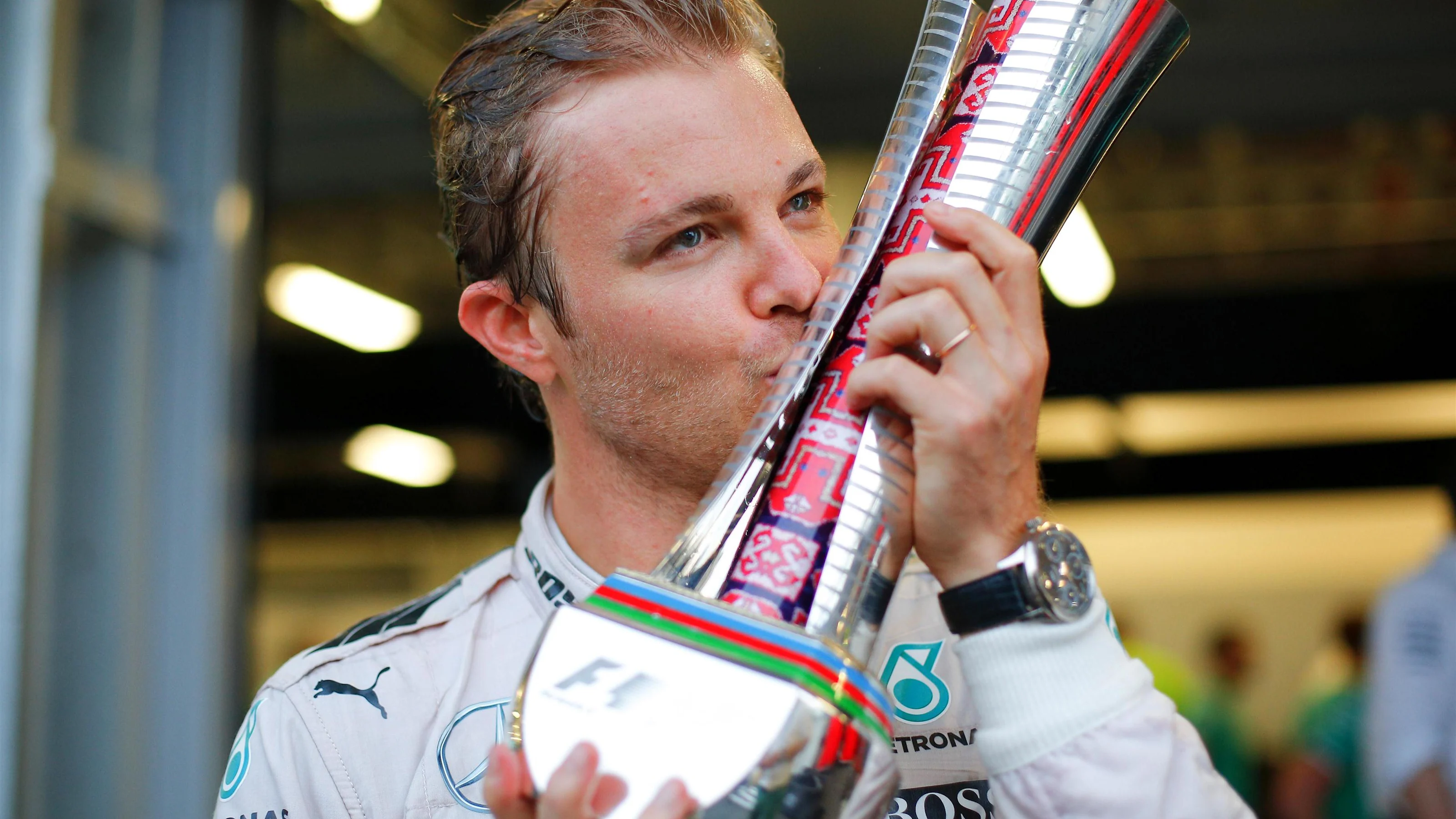 Race winner Nico Rosberg (GER) Mercedes AMG F1 celebrates with the trophy at Formula One World