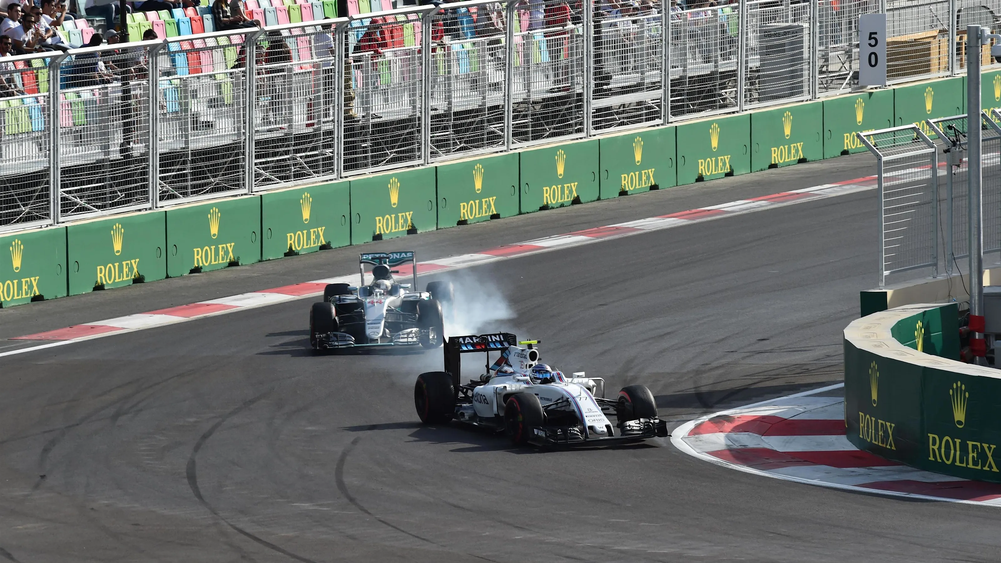 Valtteri Bottas (FIN) Williams FW38 locks up and Lewis Hamilton (GBR) Mercedes-Benz F1 W07 Hybrid