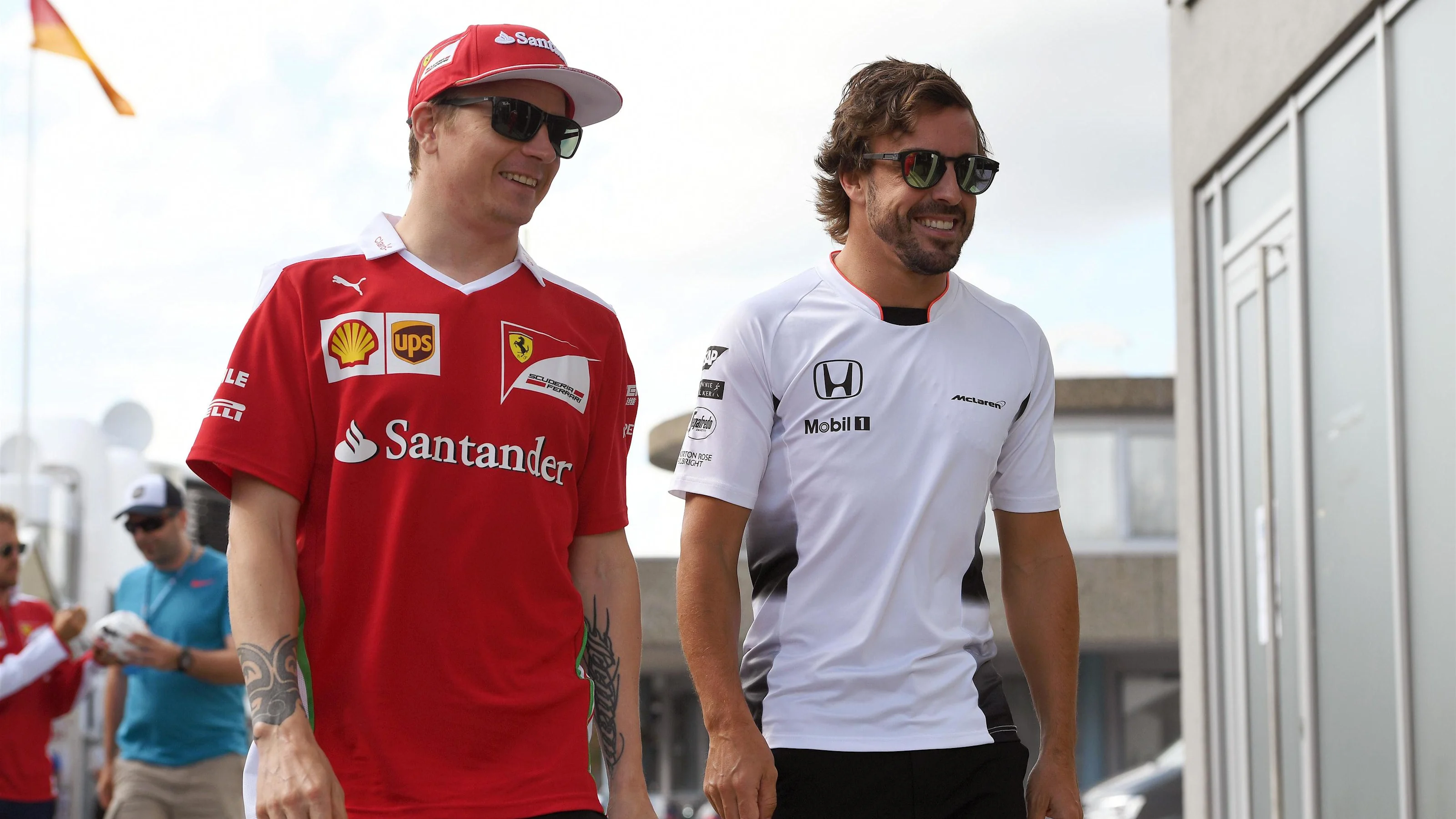 Kimi Raikkonen (FIN) Ferrari and Fernando Alonso (ESP) McLaren at Formula One World Championship,